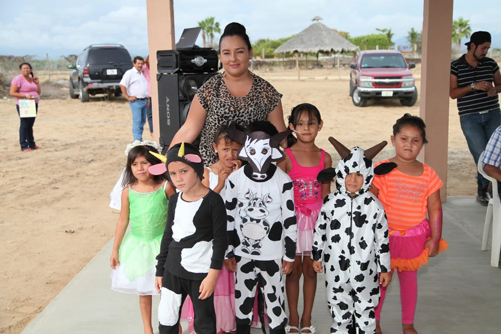 The kids in their performance costumes with Veronica, their third teacher of the year. Butterflies and cows. Emilio (left) is wearing the cow costume. The first costume I have made by hand as a mom.
