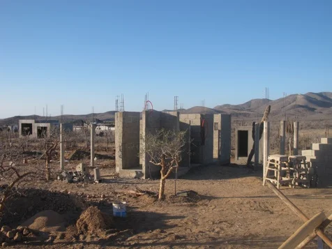 Wider North West view of bedroom building from front entrance before earth bags and foundation. Photo taken on January 29th, 2012.