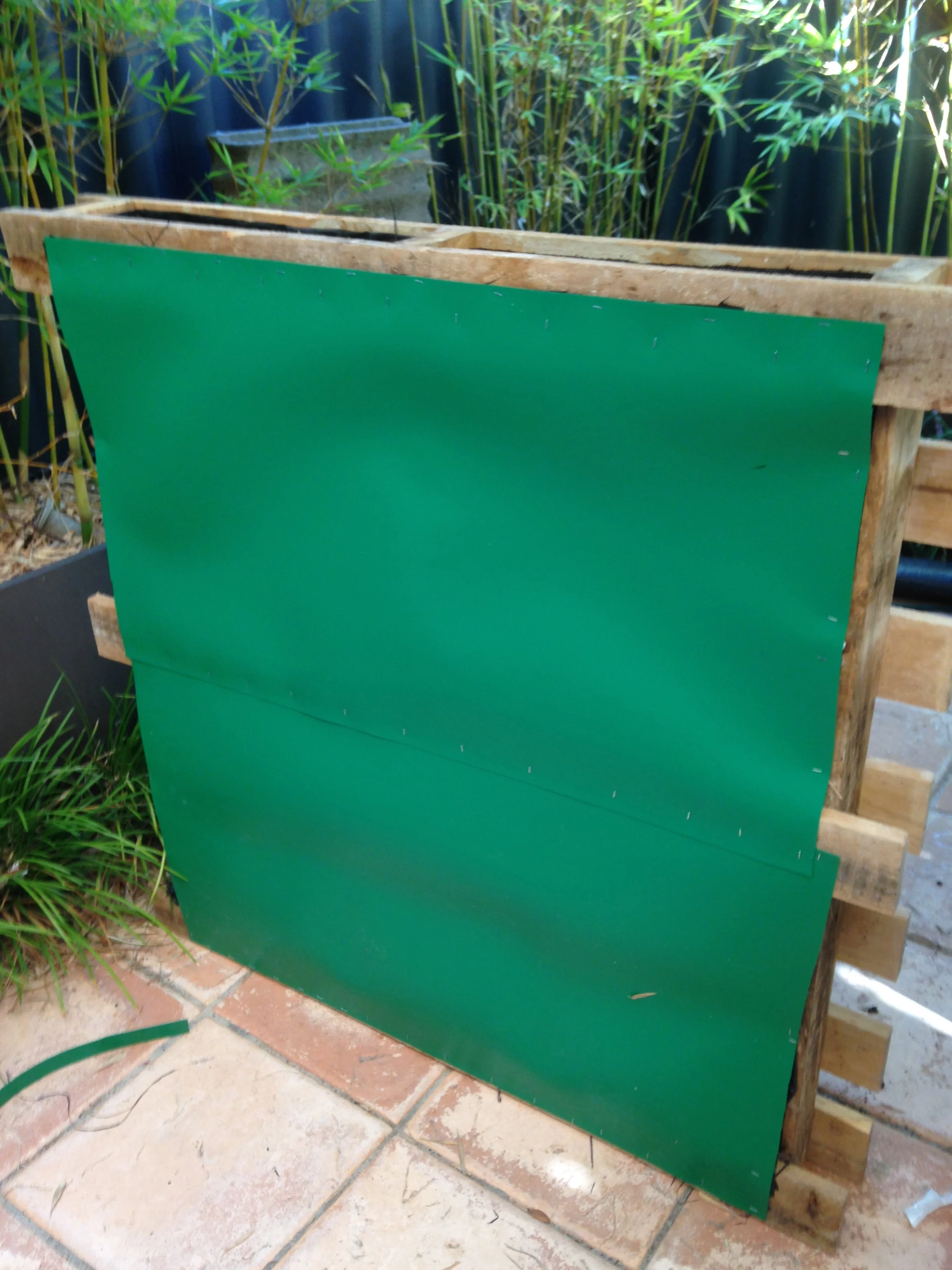 My waterproof backing is some root barrier that I had in the garage. Blueboard would work just as well, but you will need to nail it on.