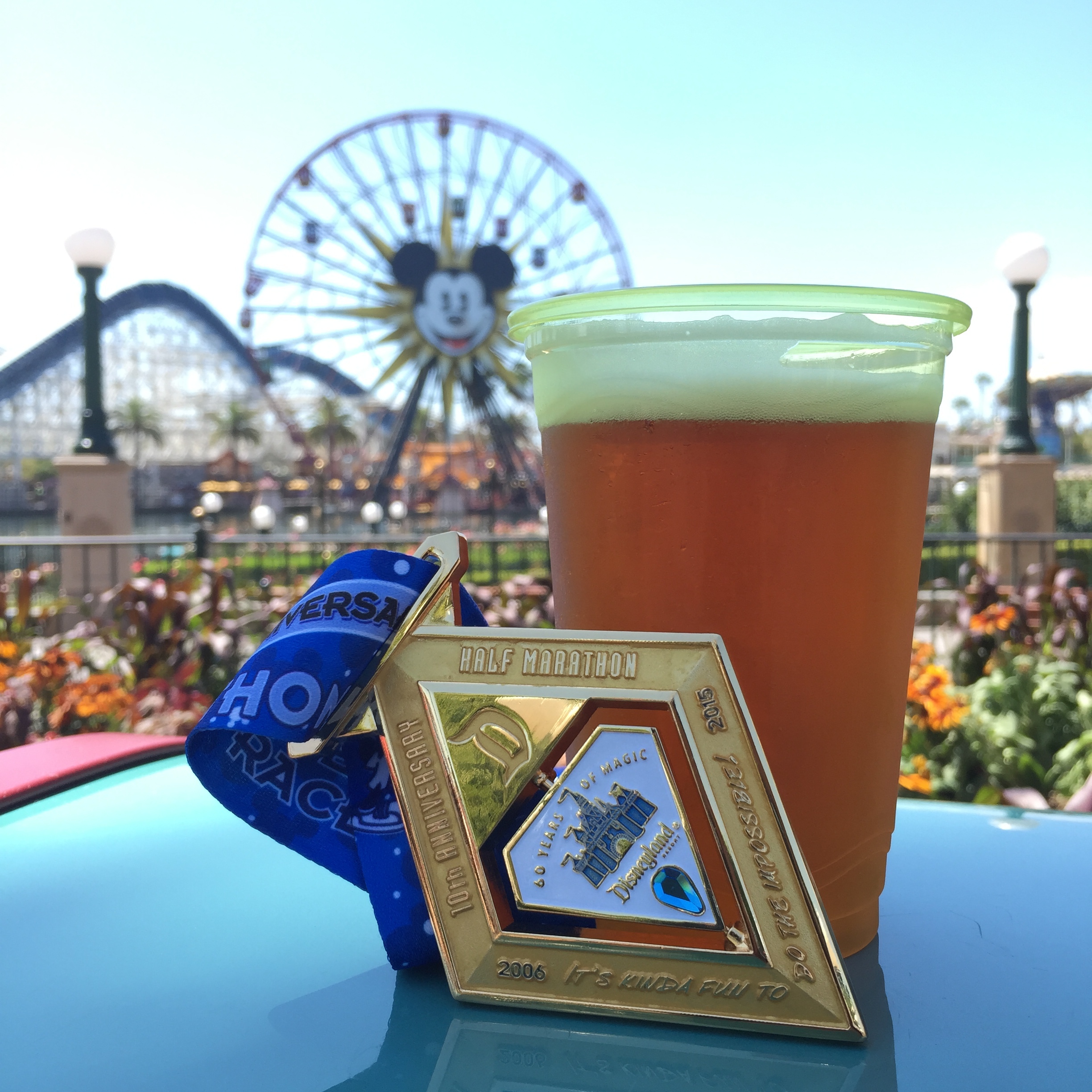  Post run beer and Disneyland Half 10th Anniversary medal. It spins! 