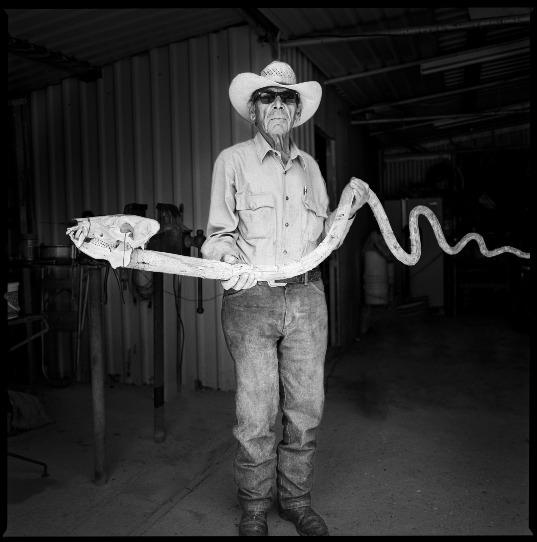  Man with his replica snake Marfa, Texas 2013    1:1  