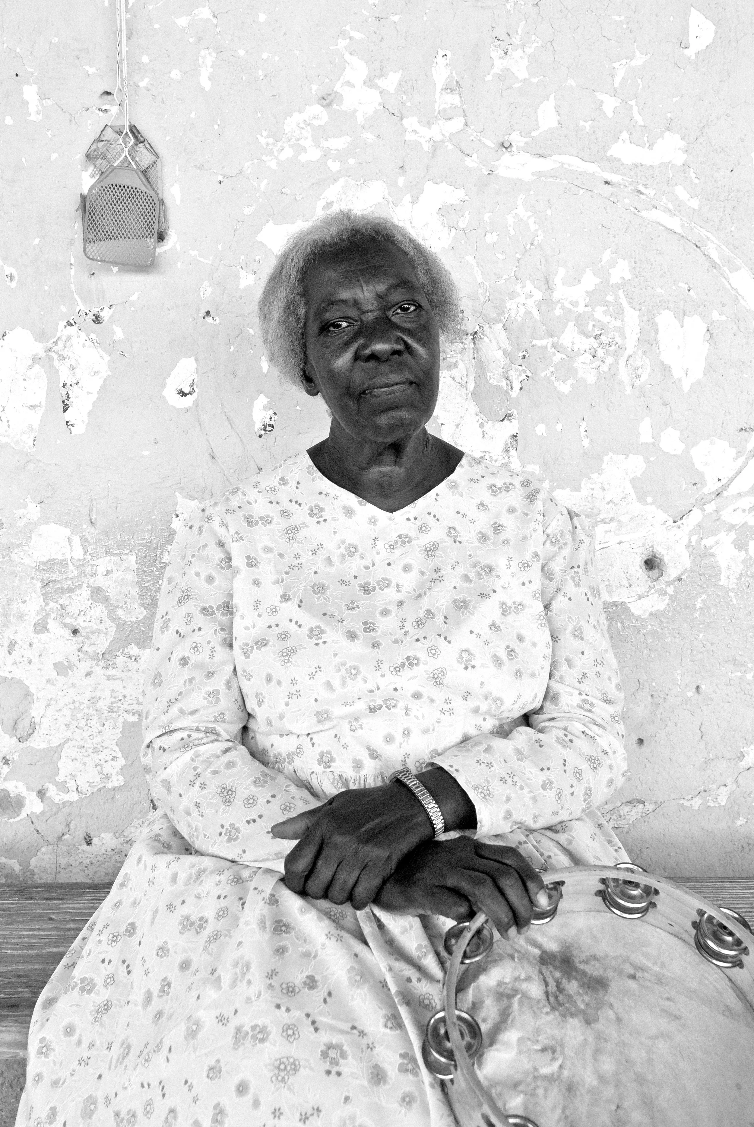 Churchgoer sitting on the porch Terlingua, Texas 2010 Made digitally with Nikon D800