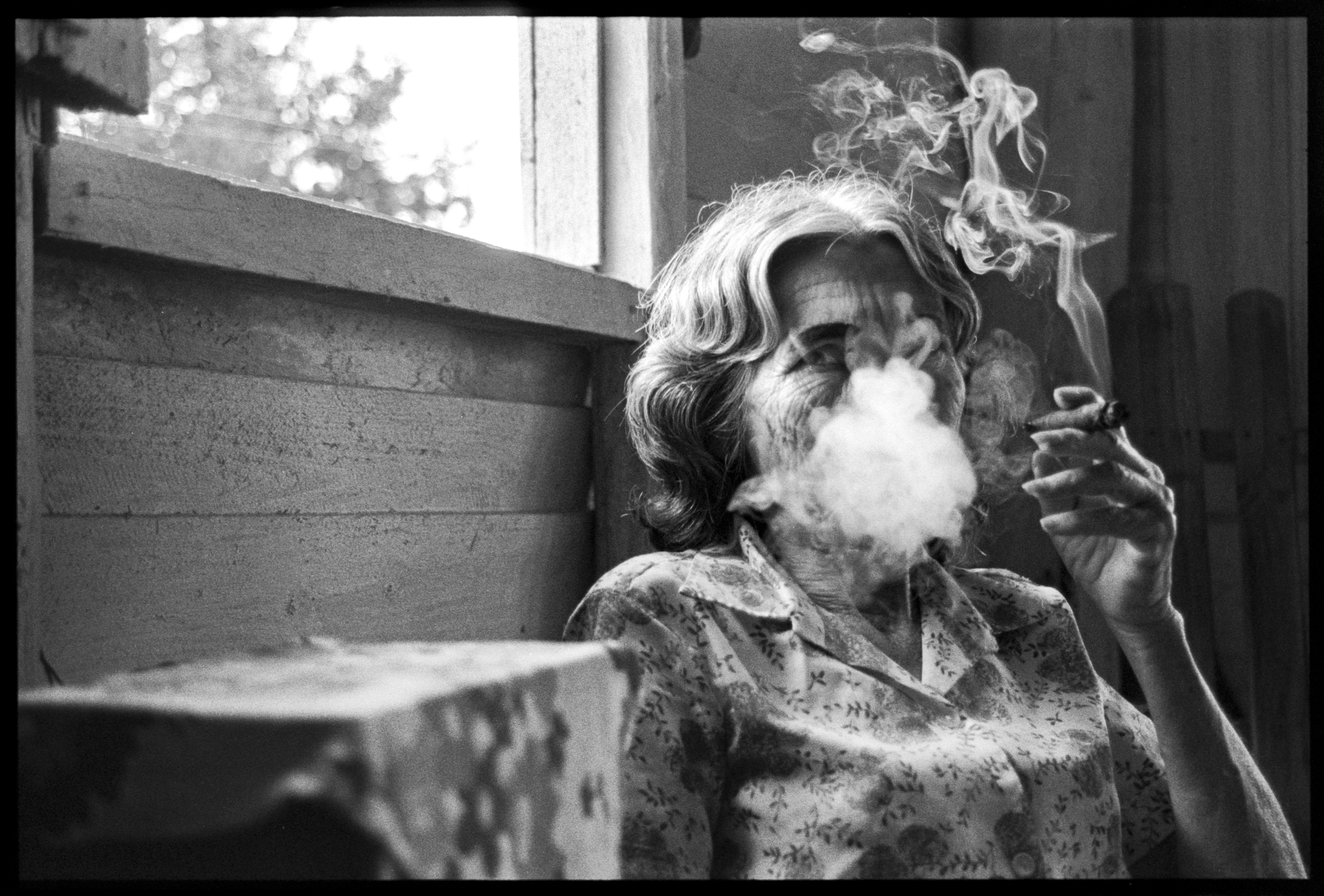  Woman smoking a cigar Viñales, Cuba, 2003    3:2  