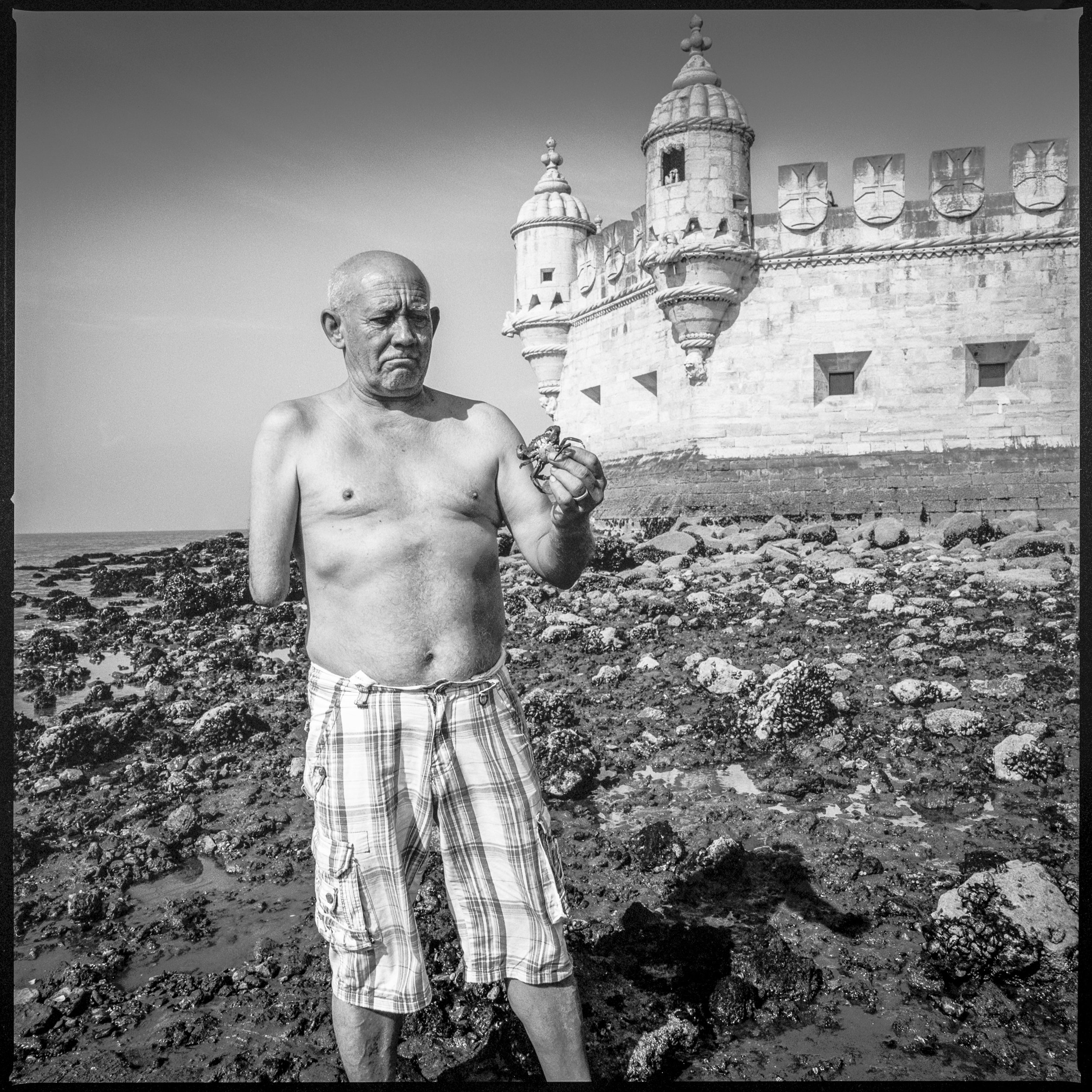  man on shore Lisbon, Portugal, 2018    1:1  