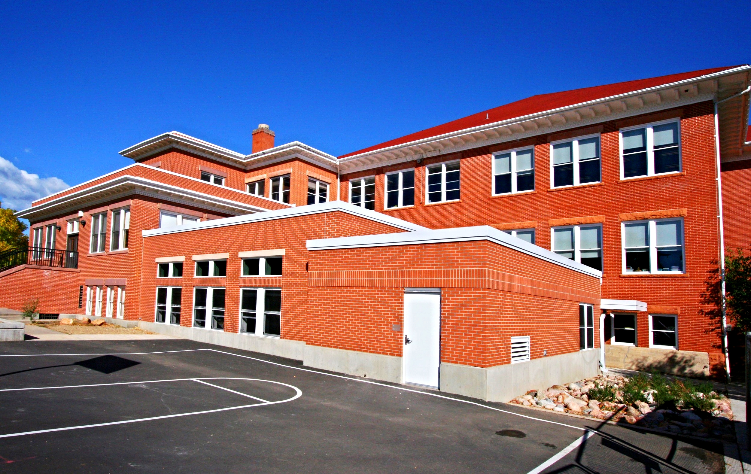 UNIVERSITY HILL ELEMENTARY SCHOOL - 2,330 SF addition and 6,184 SF renovation. Scope of work includes art and music facilities and more space for administrative offices to be added to the school, originally built in 1905. Also includes interior finish upgrades, roof repairs and improvements to the fire alarm, intercom and security systems, and upgrades to outdoor recreational areas.