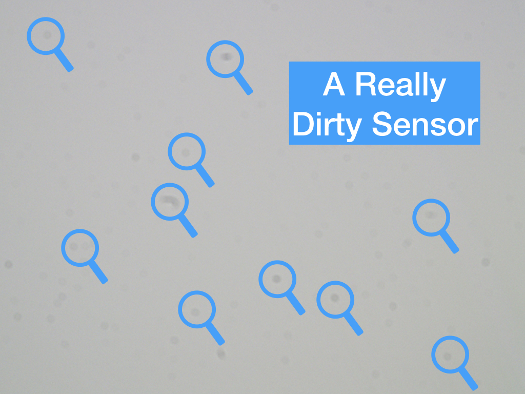 Example of a really dirty sensor, shot on white paper.