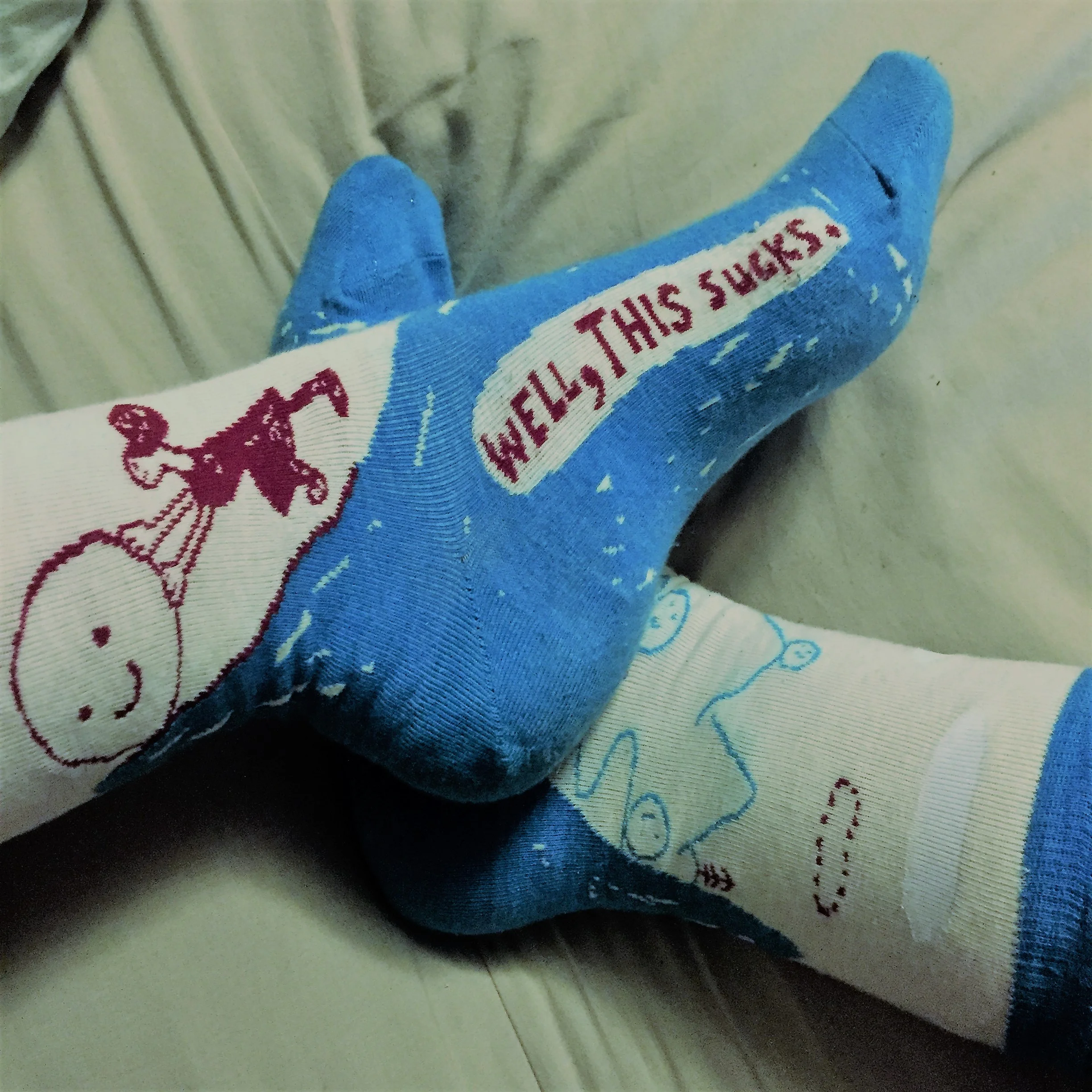 My new socks, very fitting for how we feel. 