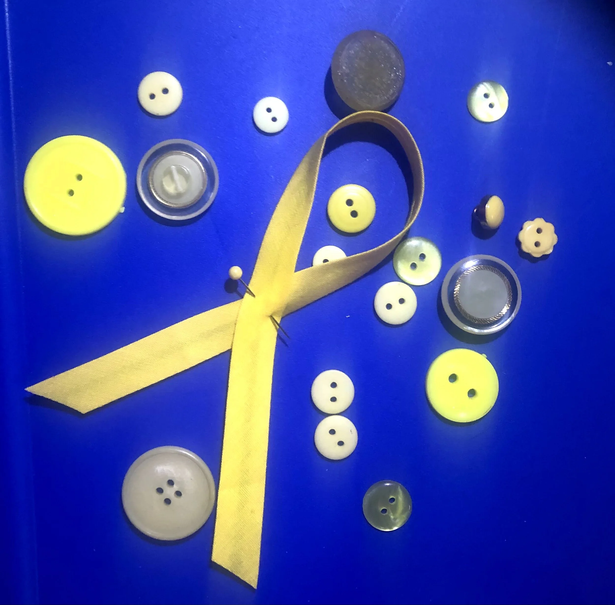 Gold ribbon childhood cancer awareness.jpg