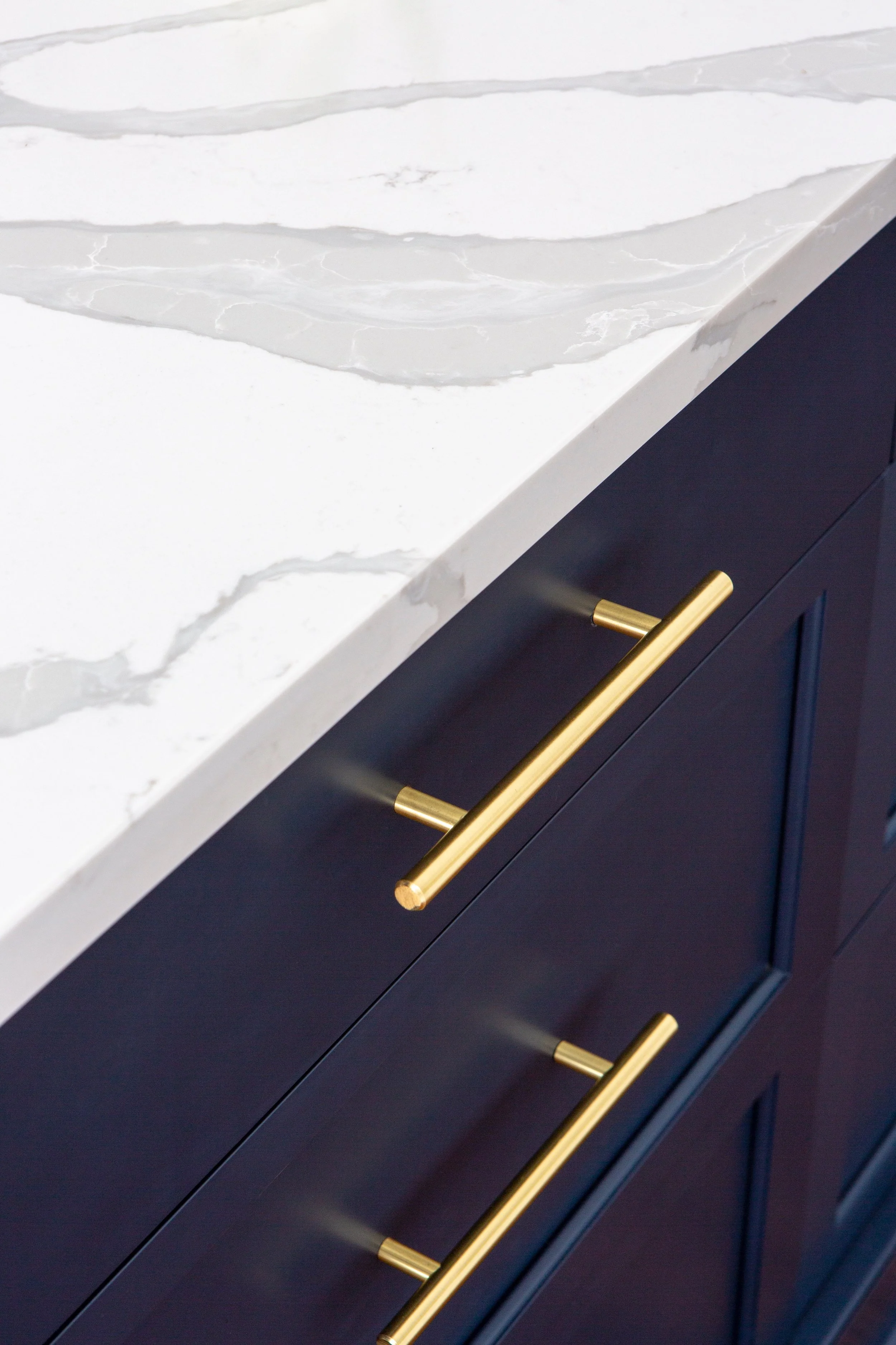 Kings Drive Blue island + MSI quartz + Top Knobs hardware.jpeg