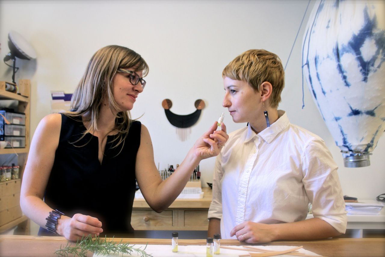 Jessica and Natalie in the Canoe studio sniffing samples.
