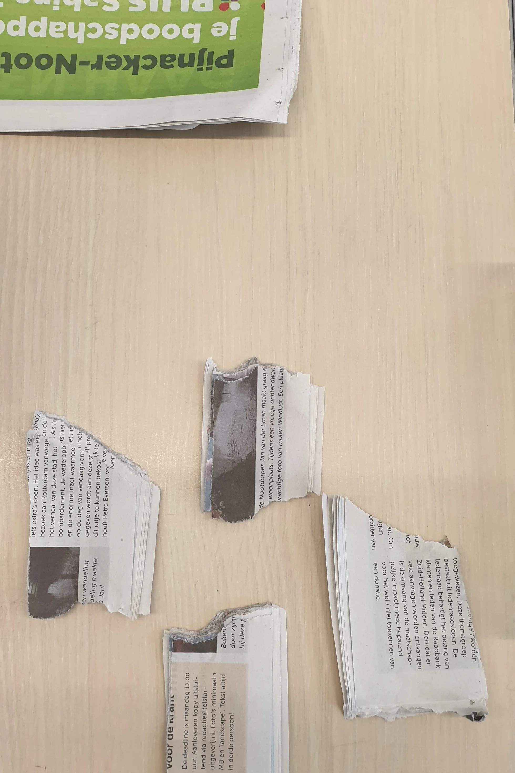 Rip or cut the paper into pieces.