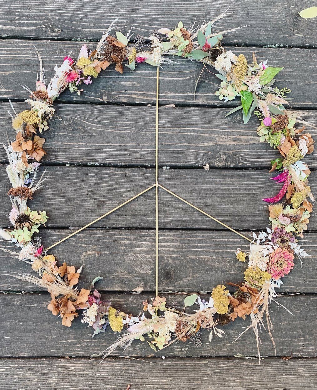 Peace, love &amp; flowers! Wishing everyone a peace filled week-and if you need a few flowers to help-call or order online! This is our large gold peace sign made with dried flowers, also available in a smaller size.
