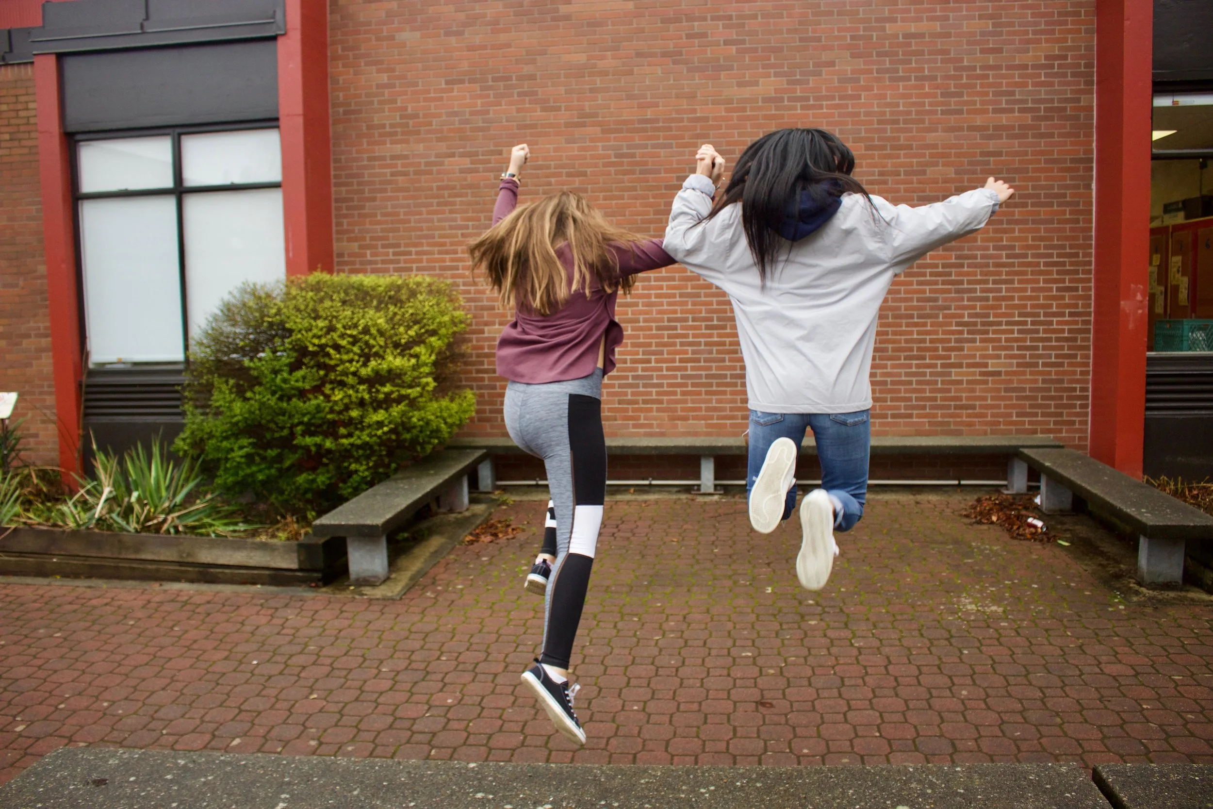 2girlsjumping.jpg