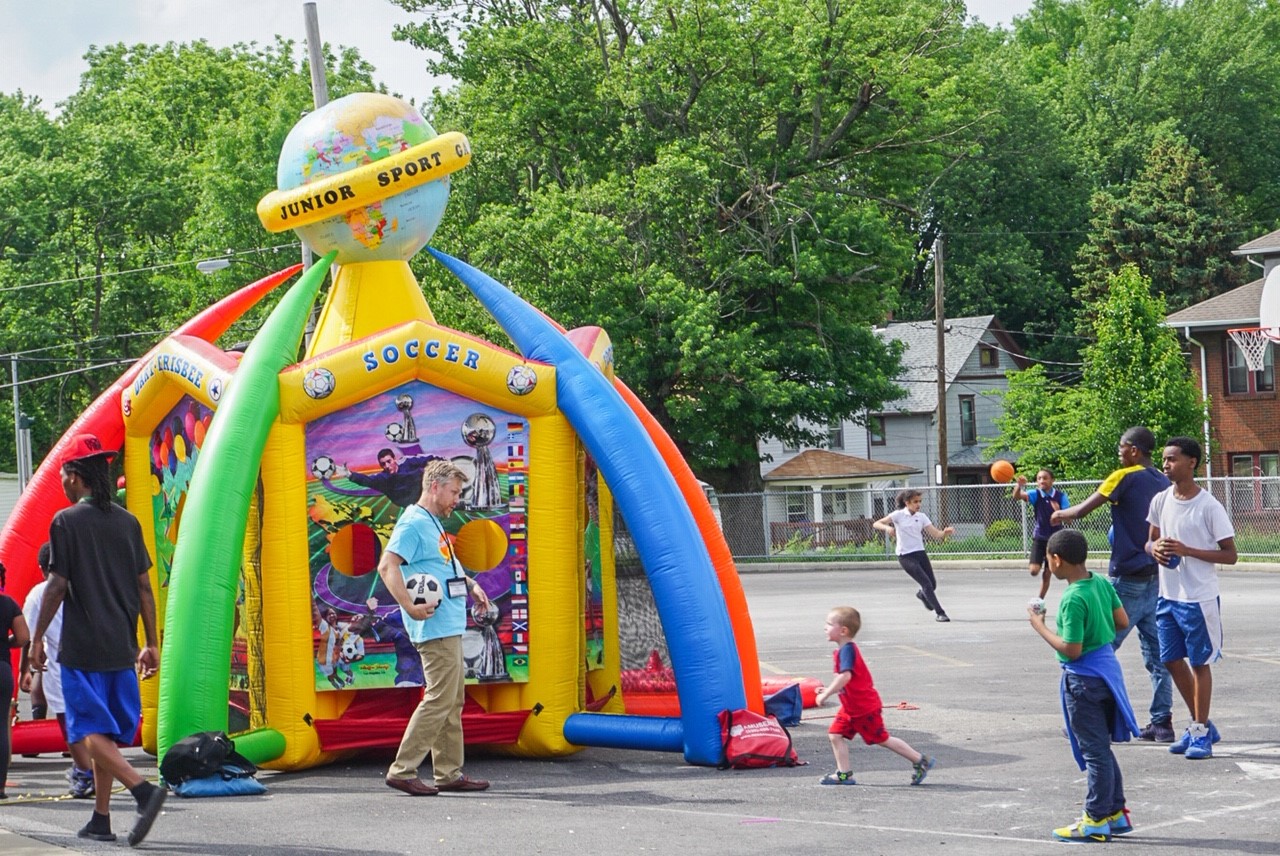 Children enjoy the jump house at a carnival promoting The Chapel Akron VBS, Superhero City: Unleashing Your Amazing! More than 100 people attended the VBS, including 25 children who attended carnivals at schools surrounding The Chapel.