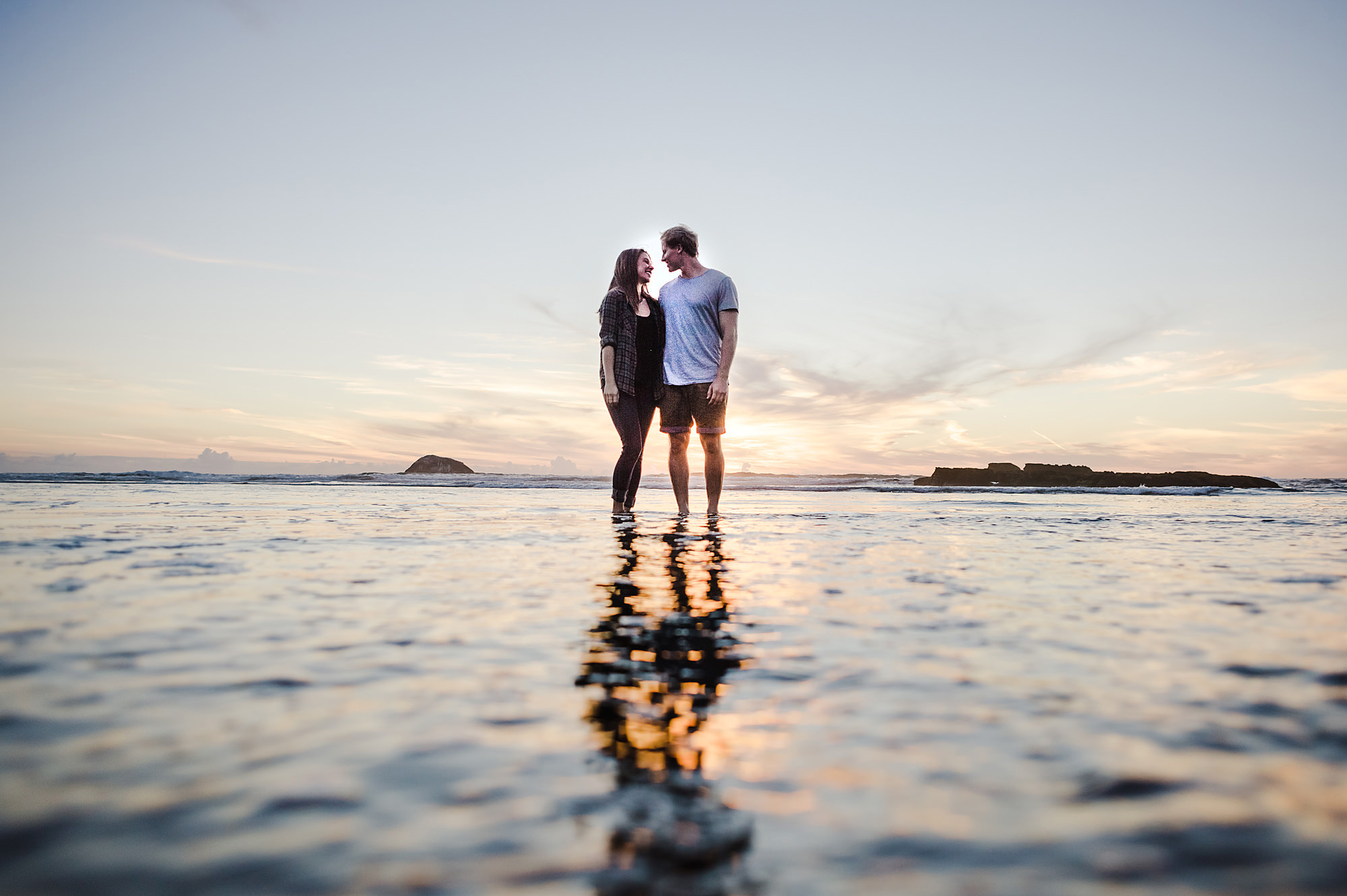 16 couple in water at beach sunset.jpg