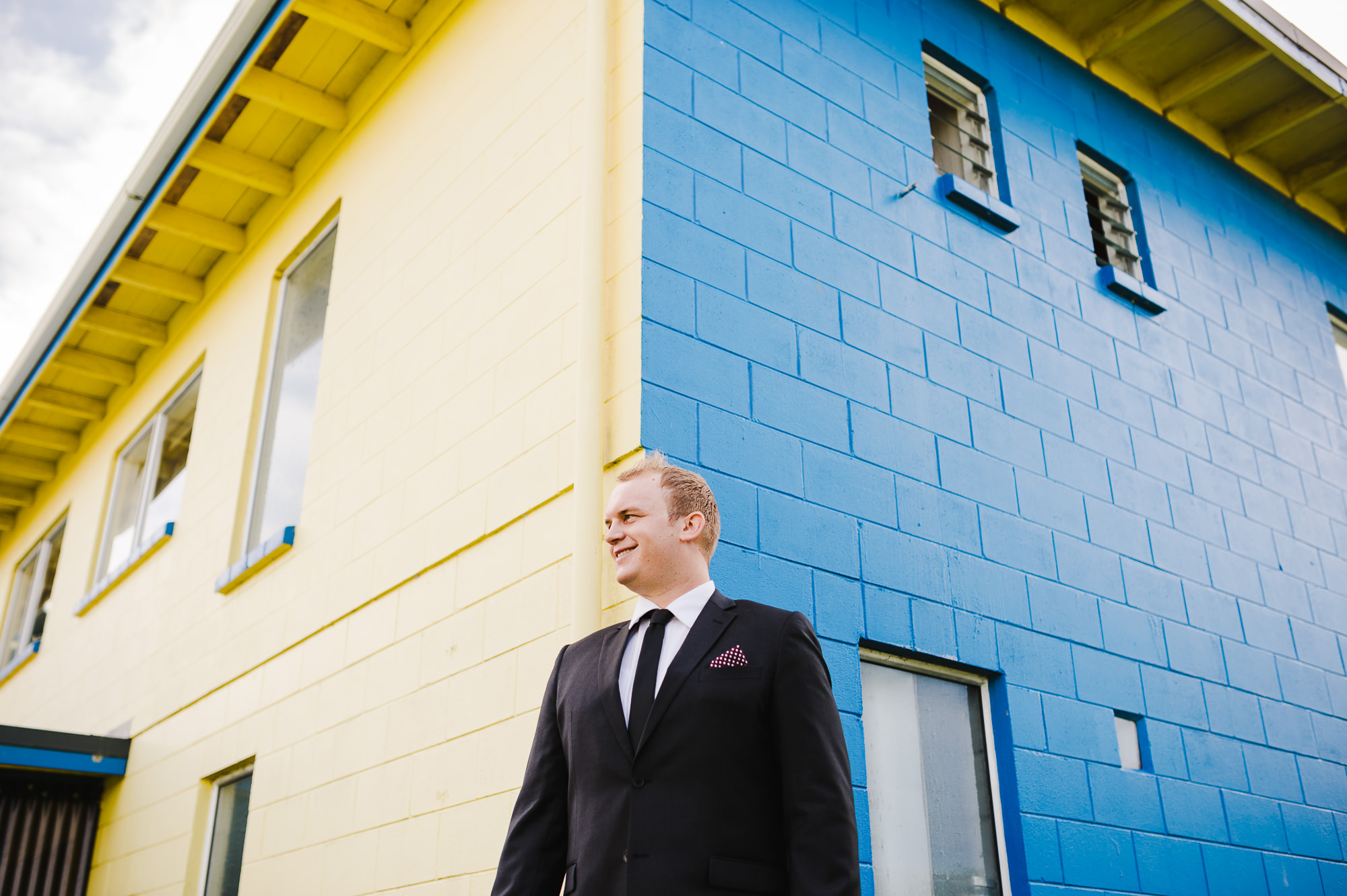 Groom with burgundy pocket square.jpg