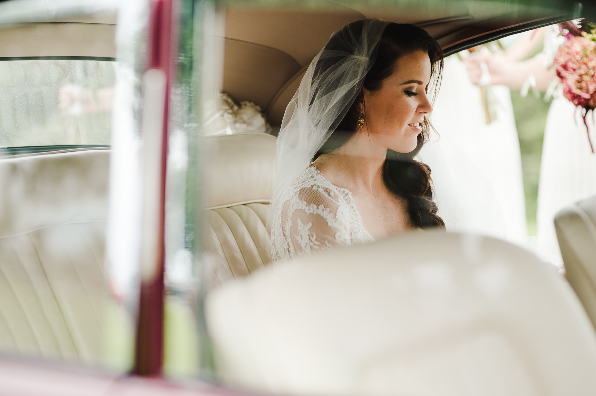 bride waiting in jaguar.jpg