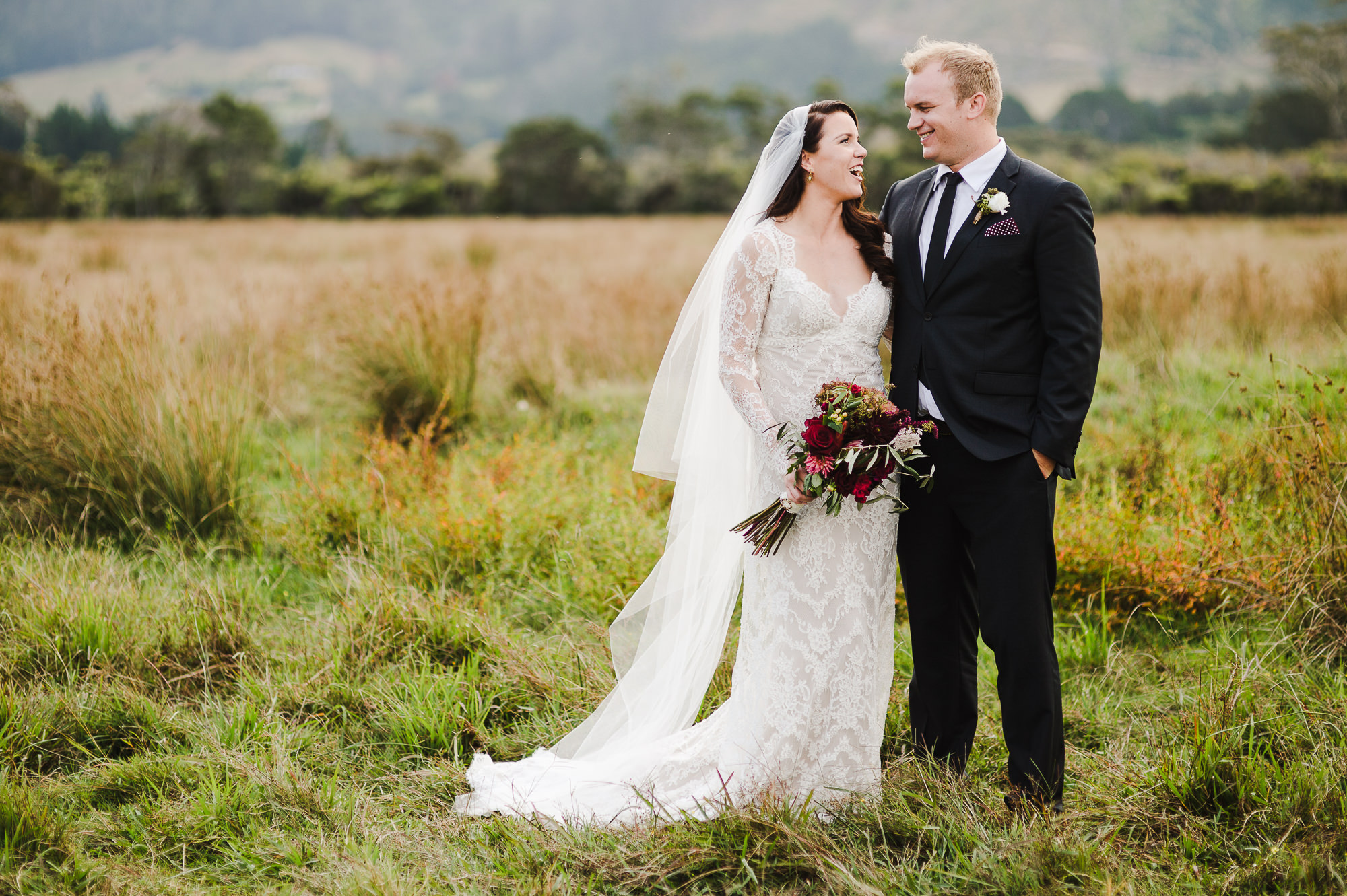 married couple in waihi beach field.jpg