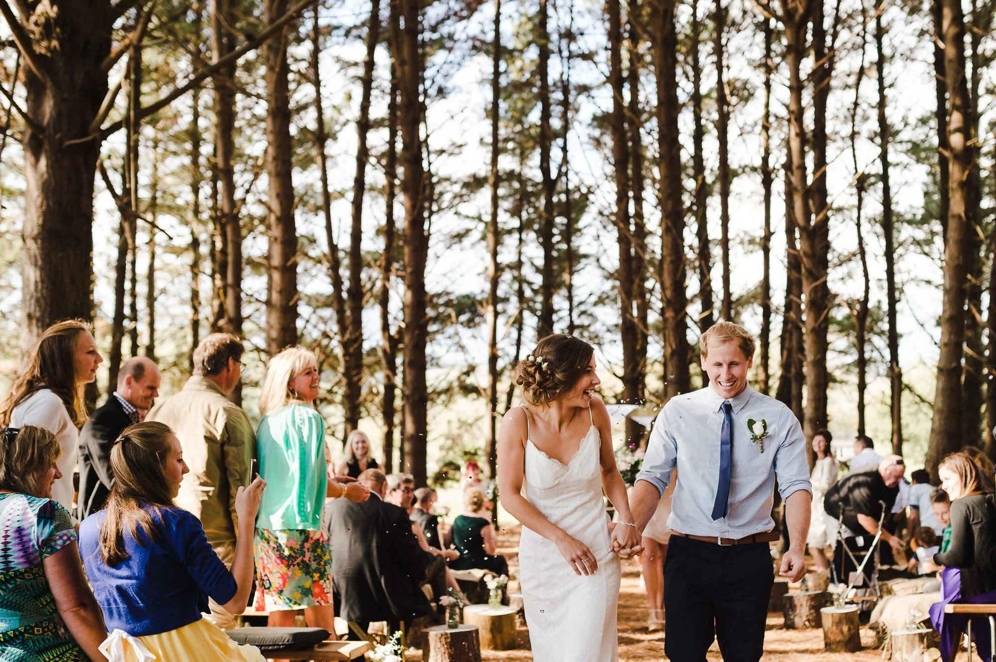 walking down aisle in forest married.jpg
