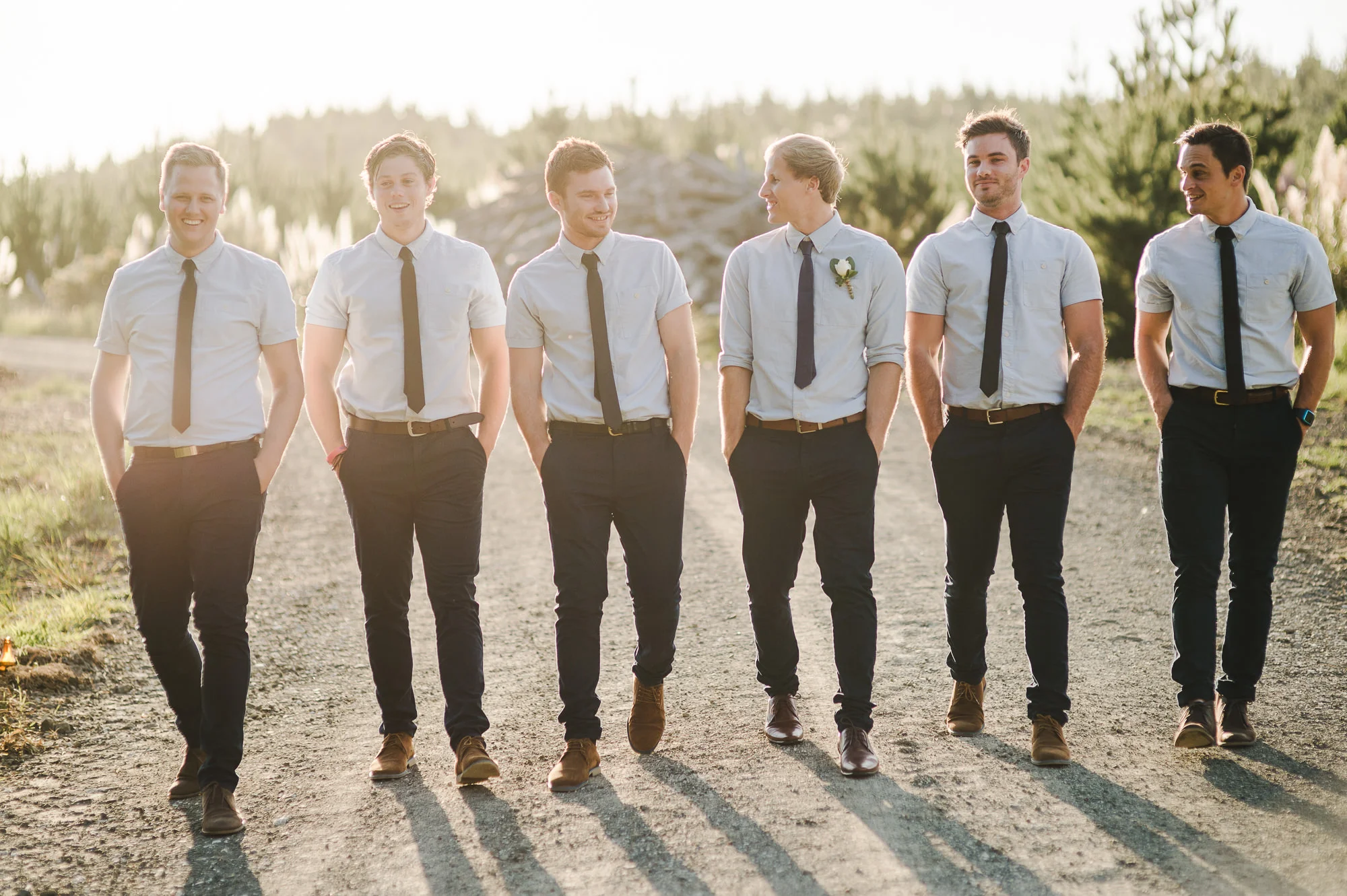 groomsmen in chinos walking.jpg