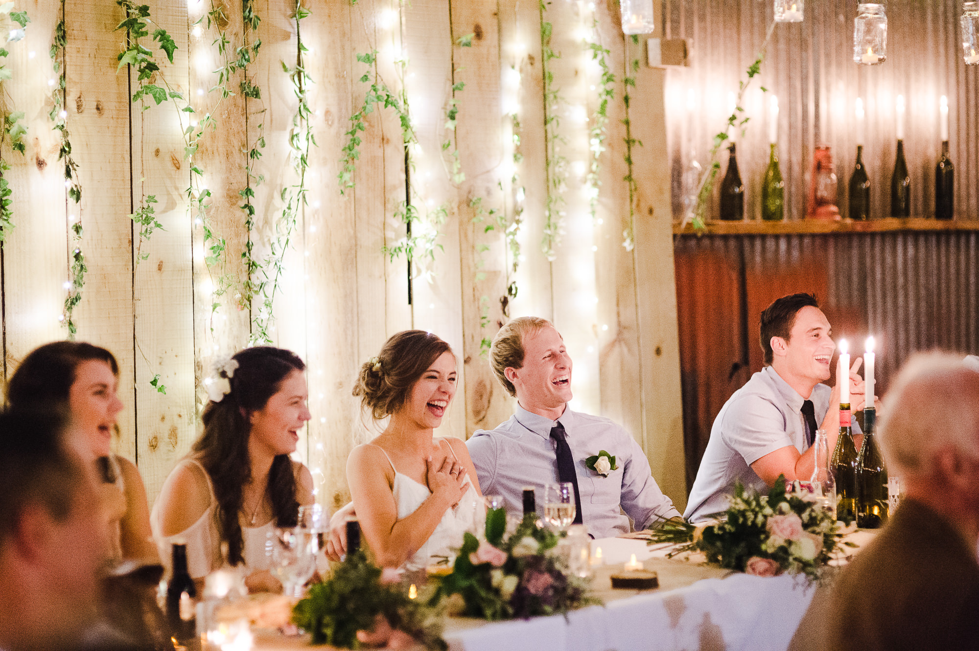 laughing couple candid moment wedding photography auckland.jpg