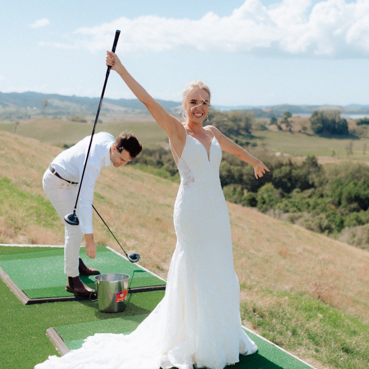 48_Kauri Bay Boomrock Bride and Groom playing golf.jpg