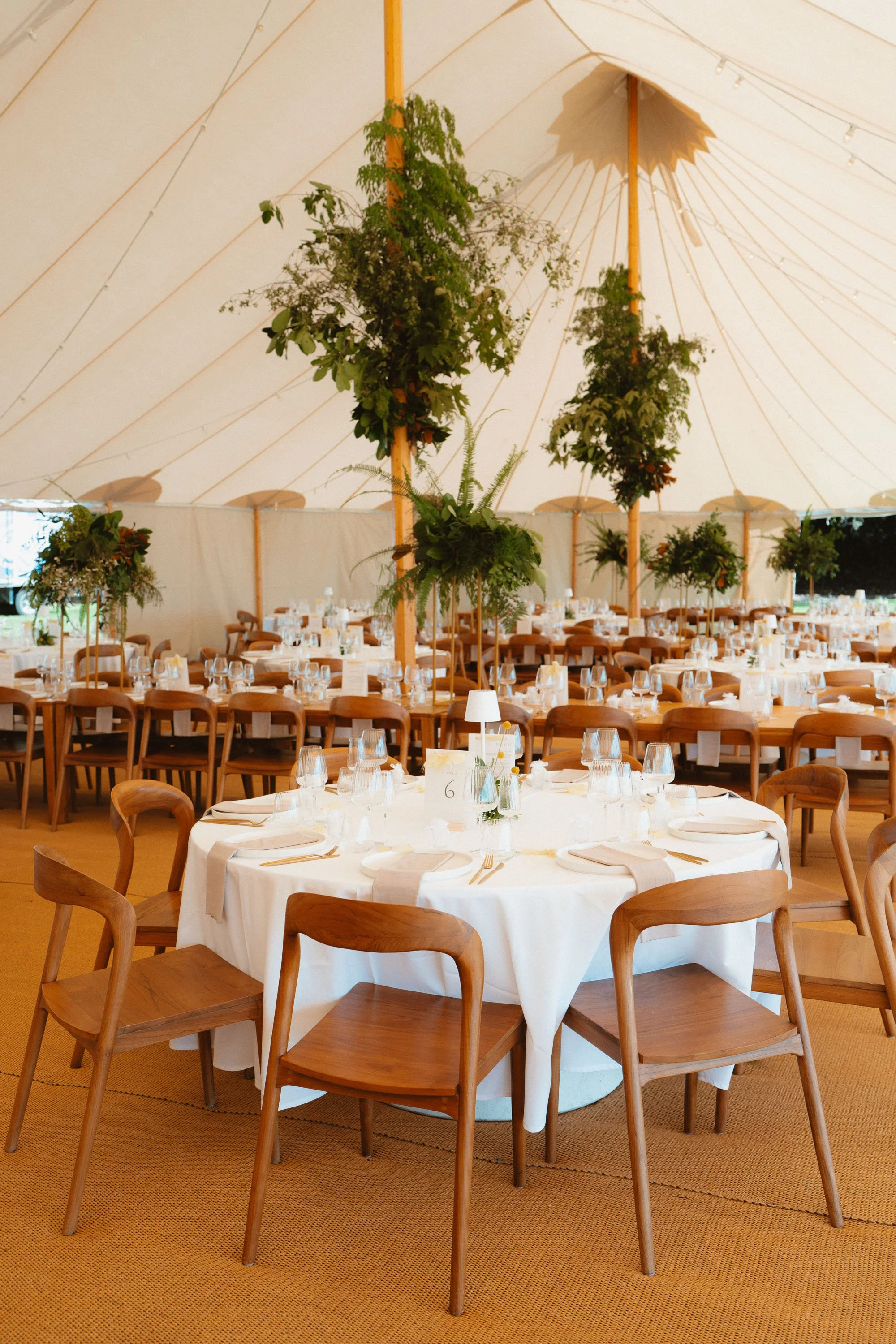 Flagship Events marquee, filled with Flock Events furniture and Branch and Bloom florals