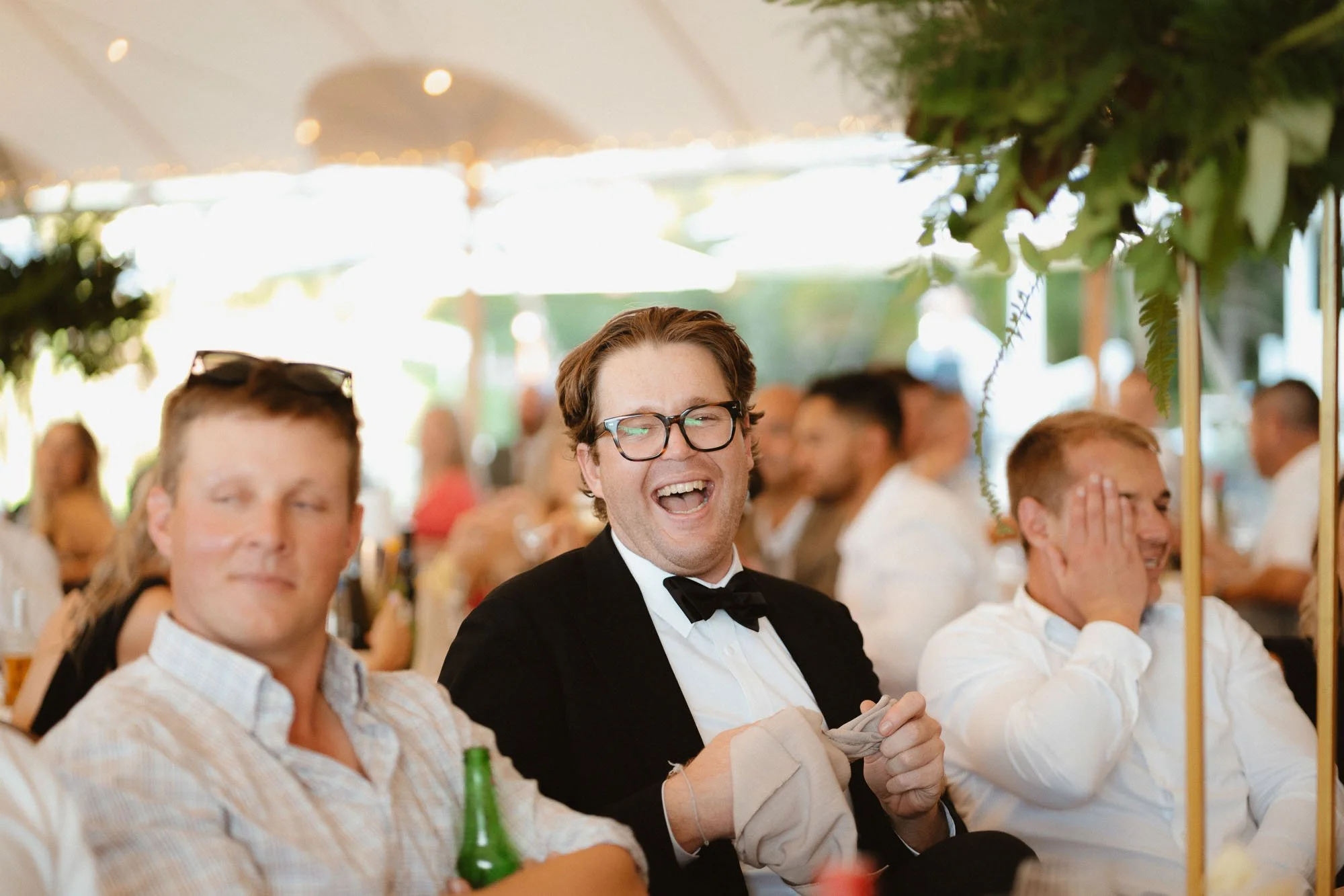 candid moment of guest laughing