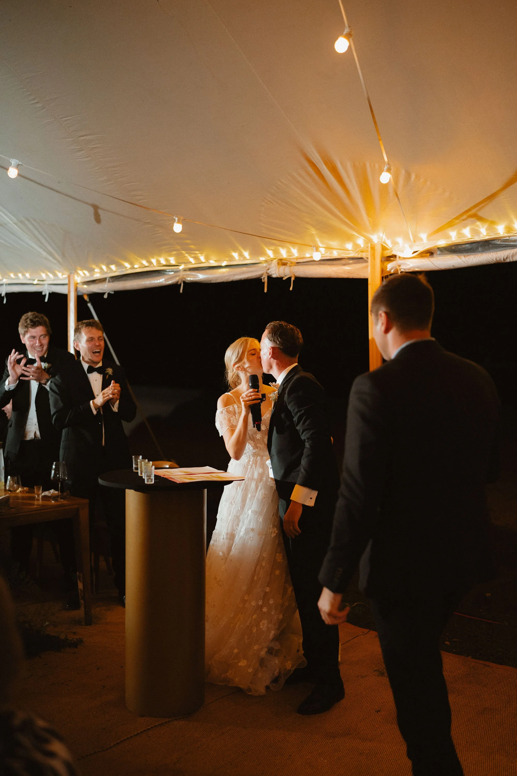 Bride and groom kissing