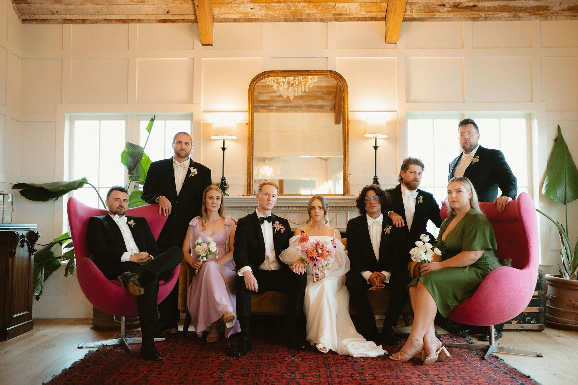 bridal party on vintage furniture at mudbrick lodge