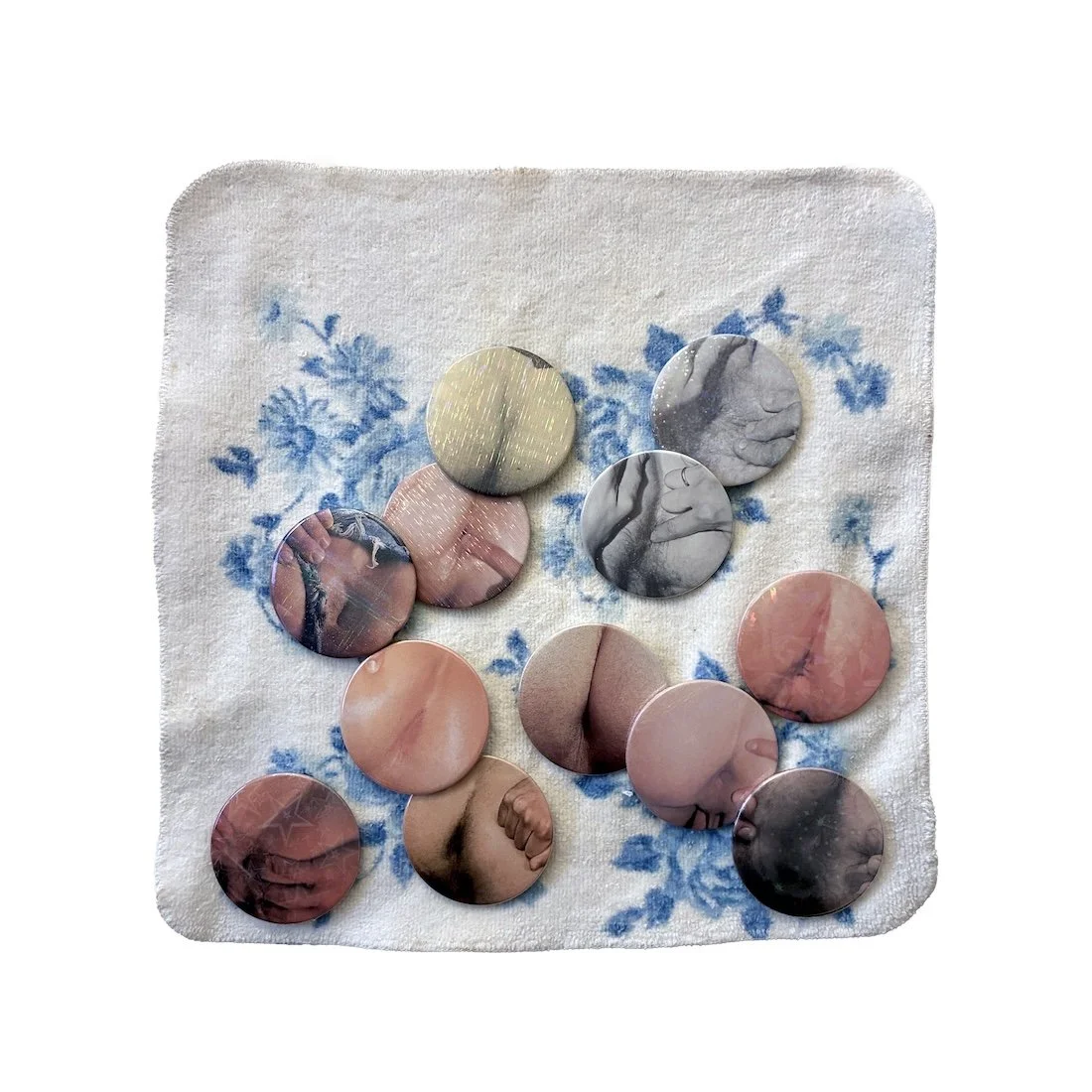 12 bussies | 11 x12 in. | vintage hand towel, found imagery, bespoke lapel pins | 2026 