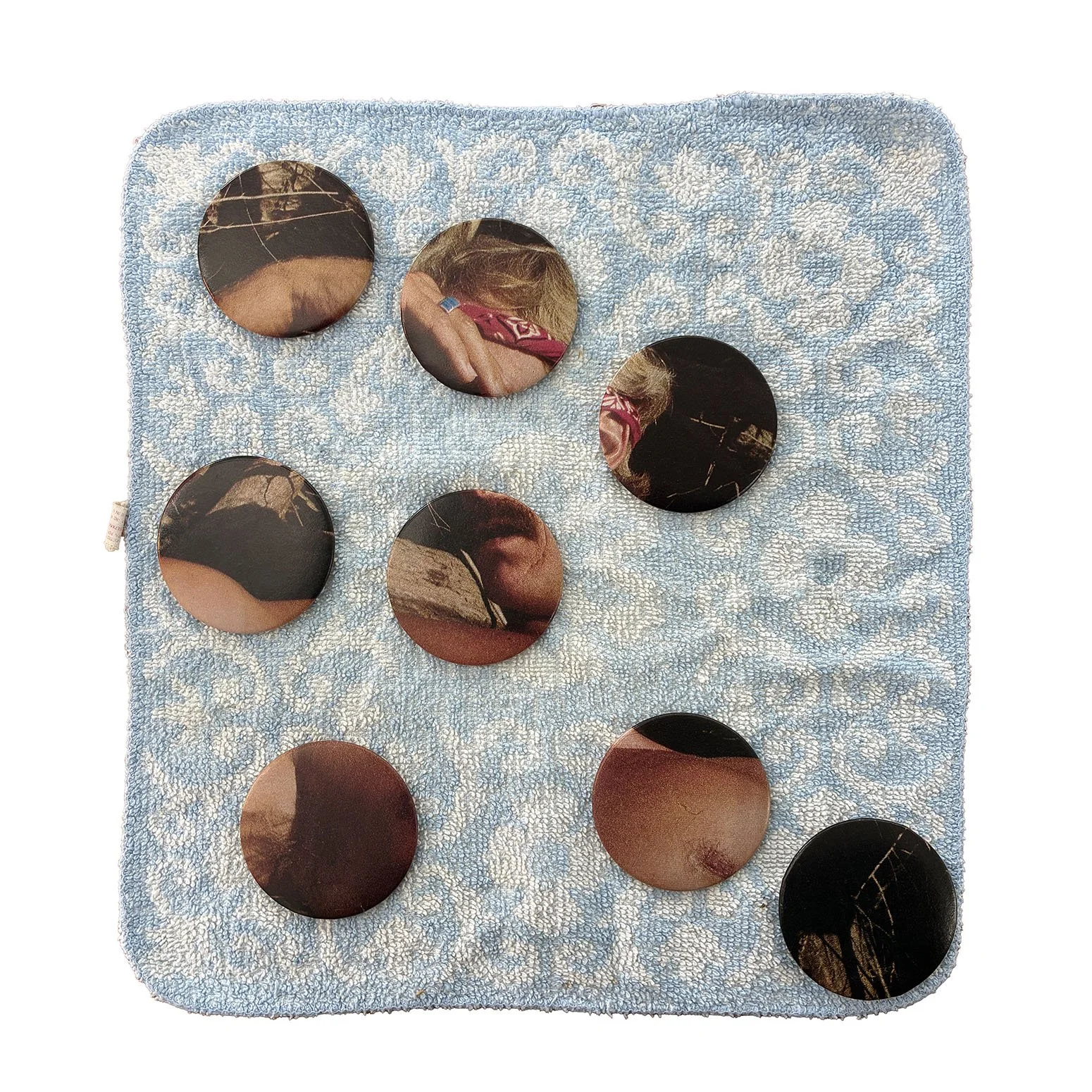 queer codes | 11 x12 in. | vintage hand towel, found imagery, bespoke lapel pins | 2026 