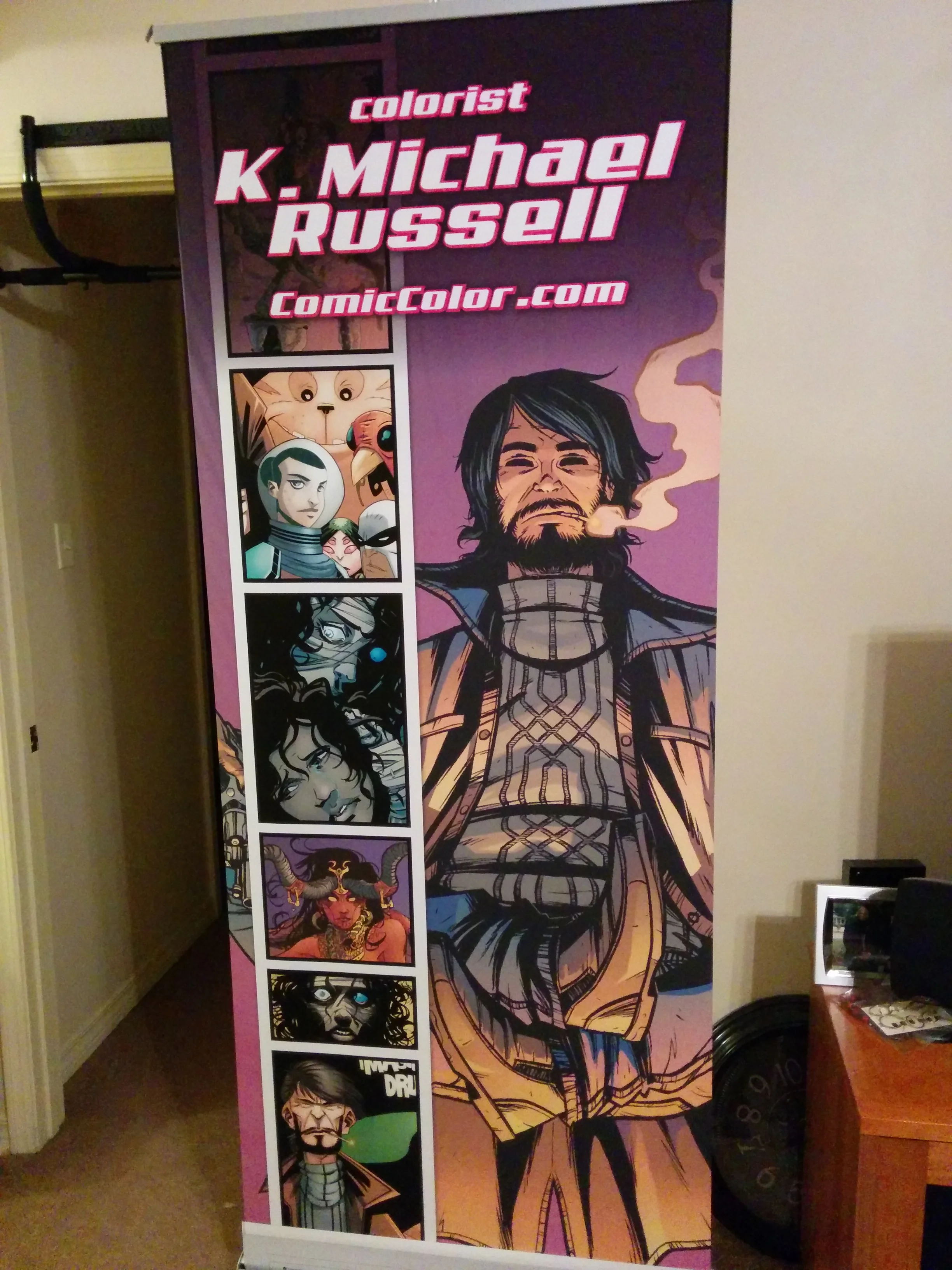 The new convention banner just arrived, and it looks fantastic. Thanks to Mr. Steve Becker for the awesome design. The featured image on the right is by Jonathan Brandon Sawyer. The panels going down the left side include line-art from Valentin Ramon Menendez, Francesco Prenzy Chiappara, and Stephen Green. So thanks to all those guys. 