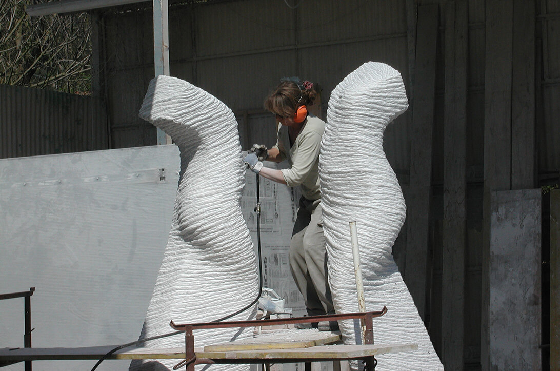 Inger Sannes carving the final surface of 'Reflections'