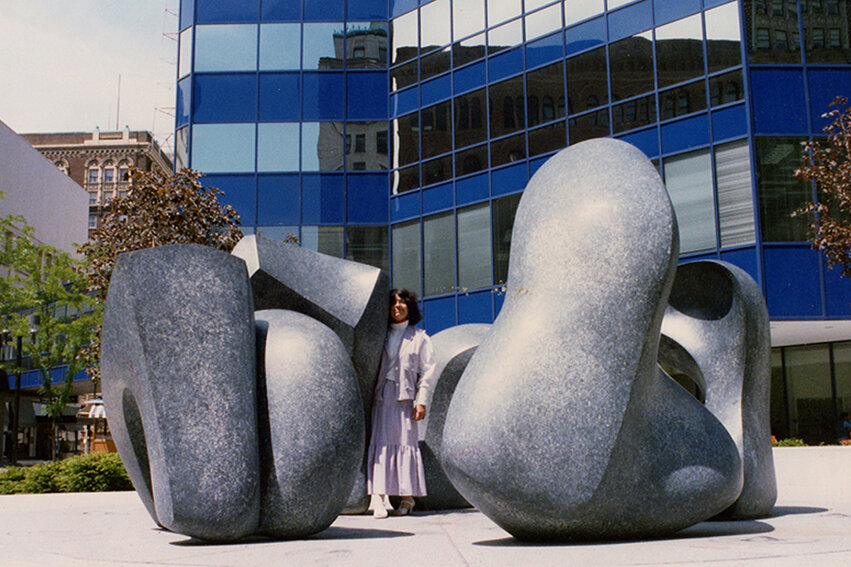 Helaine Blumenfeld with her 5 part granite work 'Family' in Milwaukee 1986