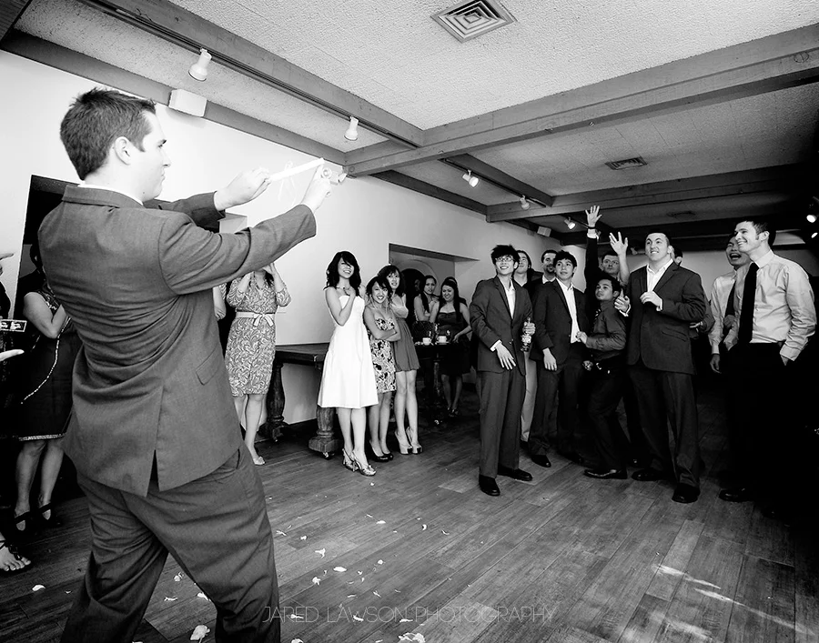 Wedding Pictures Groom Garter Toss