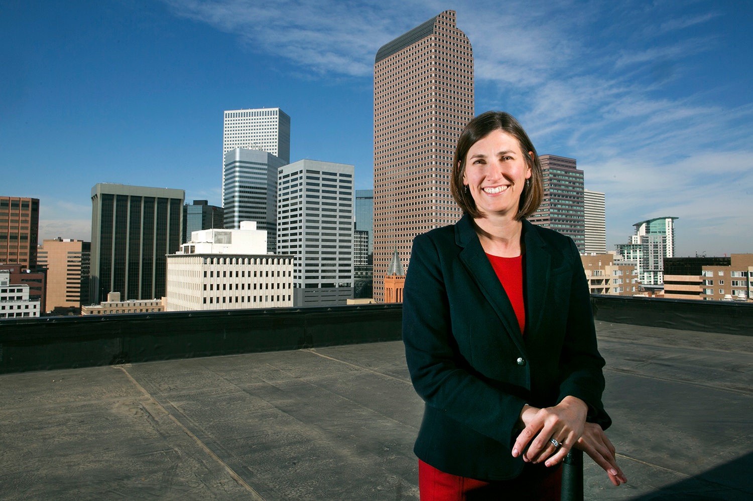 Kathleen Staks, Director of External Affairs Guzman Energy, LLC., stands for an executive portrait in the Colorado Office of Energy. (Photograph by Bear Gutierrez)