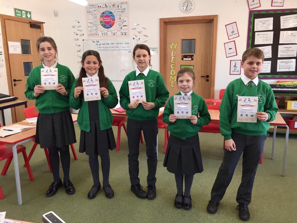 Pupils at St Peter’s receive well deserved certificates for completing a book