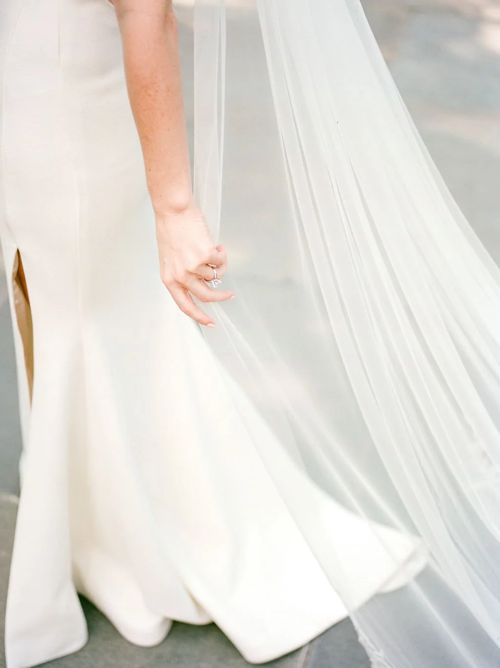 Bride and groom during intimate wedding ceremony at DC War Memorial on the National Mall in Washington DC.