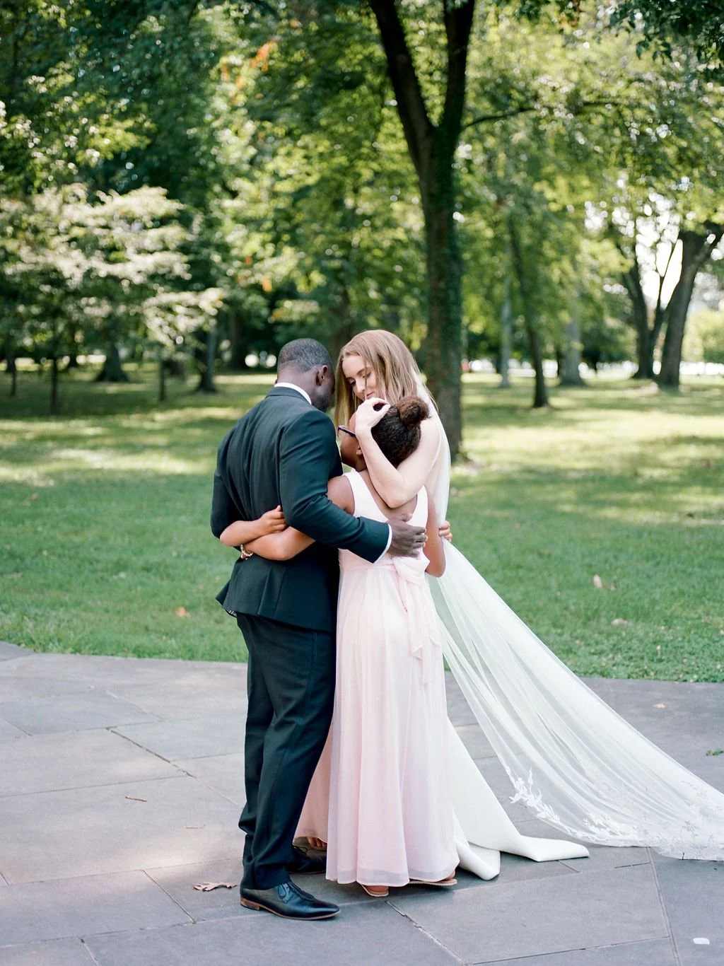 Bride and groom during intimate wedding ceremony at DC War Memorial on the National Mall in Washington DC.