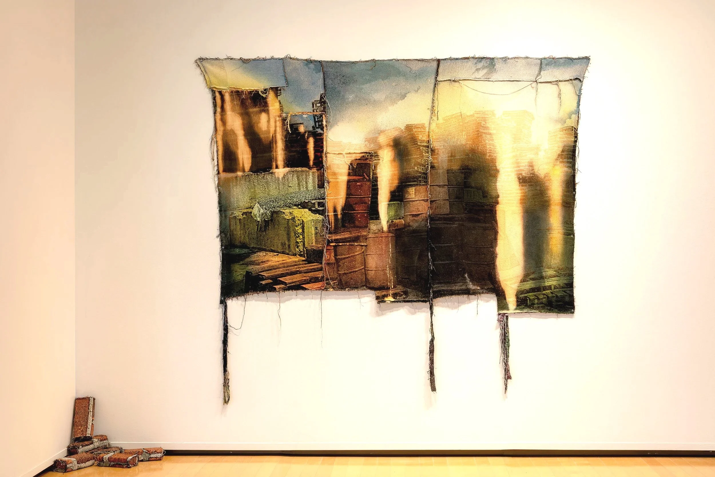  My recent body of photo-based work titled Industry Unraveled draws attention to both current practices of online commerce and the history of manufacturing in the Rust Belt. The work intertwines images that represent regional history, architecture an