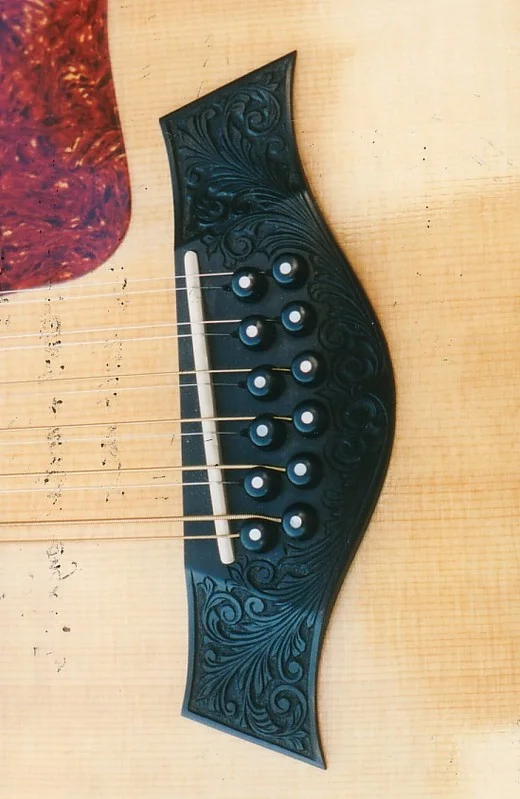 Taylor55512stgcarvedbridge.jpg