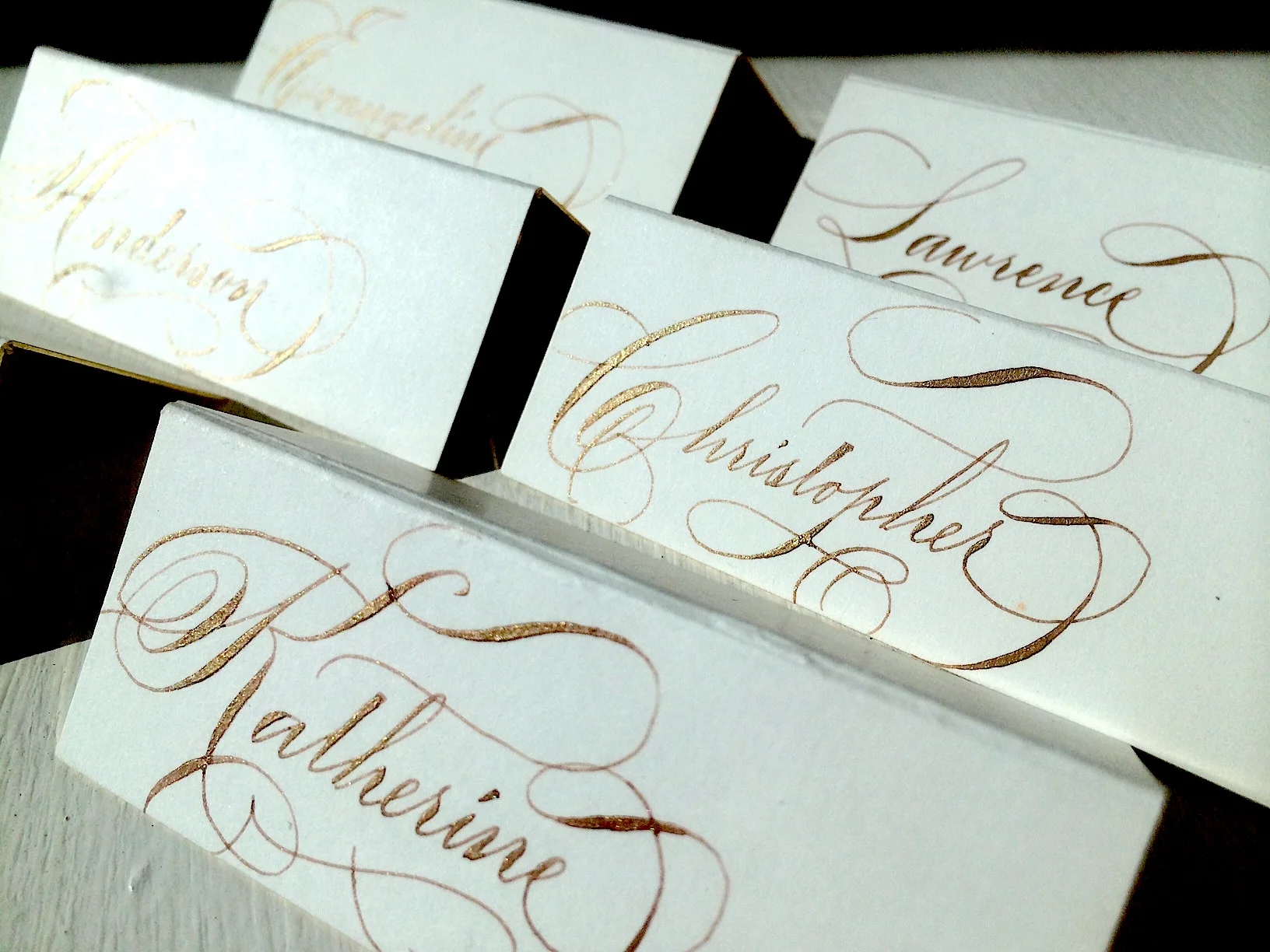 Escort cards gold ink.jpg