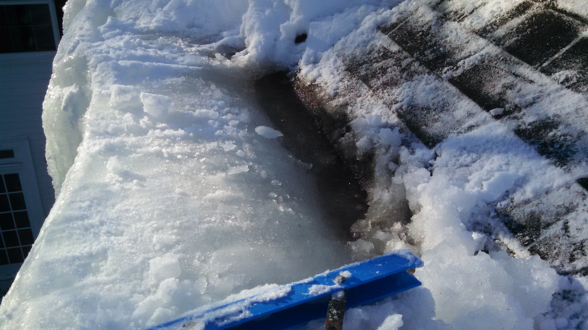 Notice the puddling to the right of the ice. This puddle has no place to go but through the roof into the home.