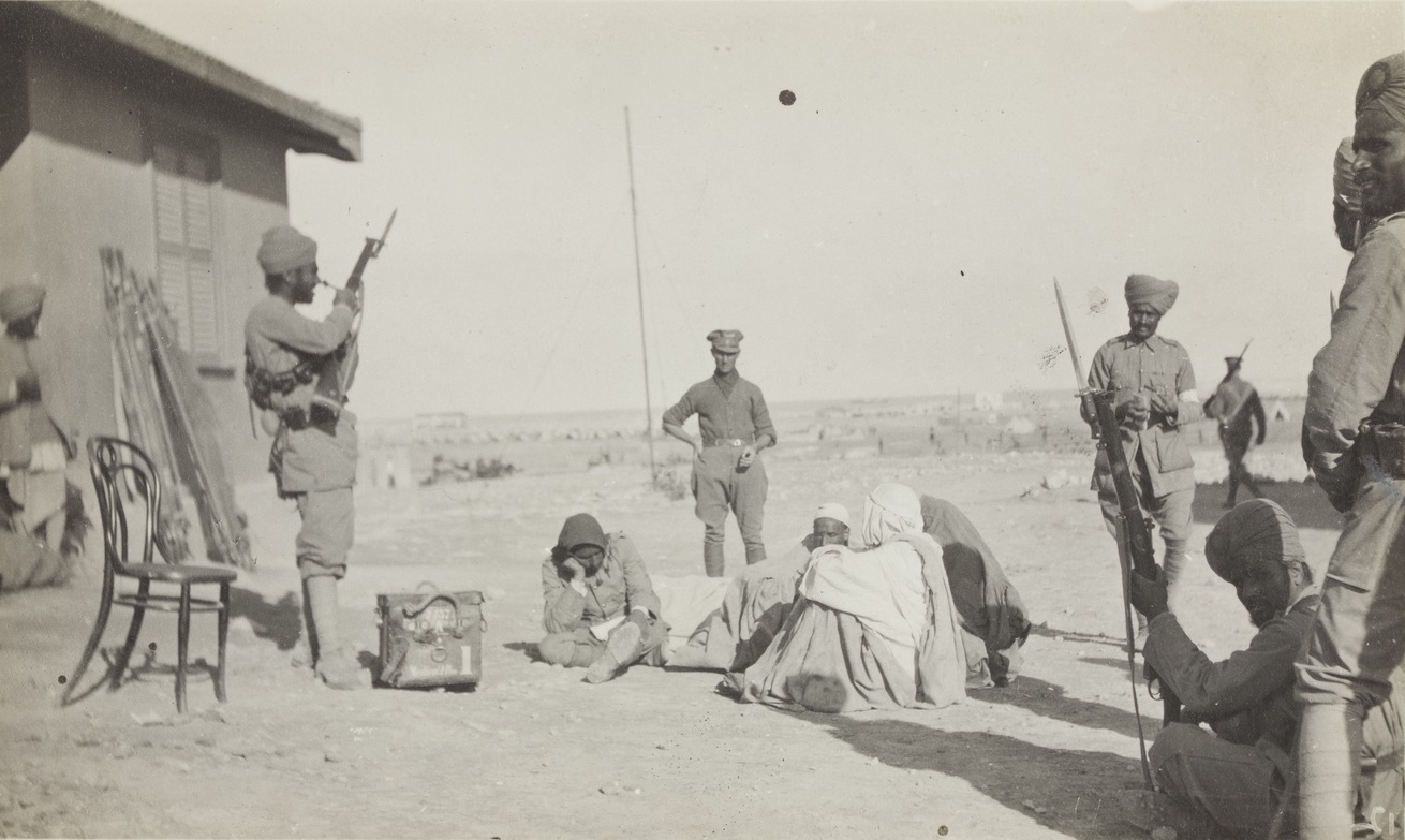 Wounded Senoussi awaiting treatment at the Jupoh Frontier.
