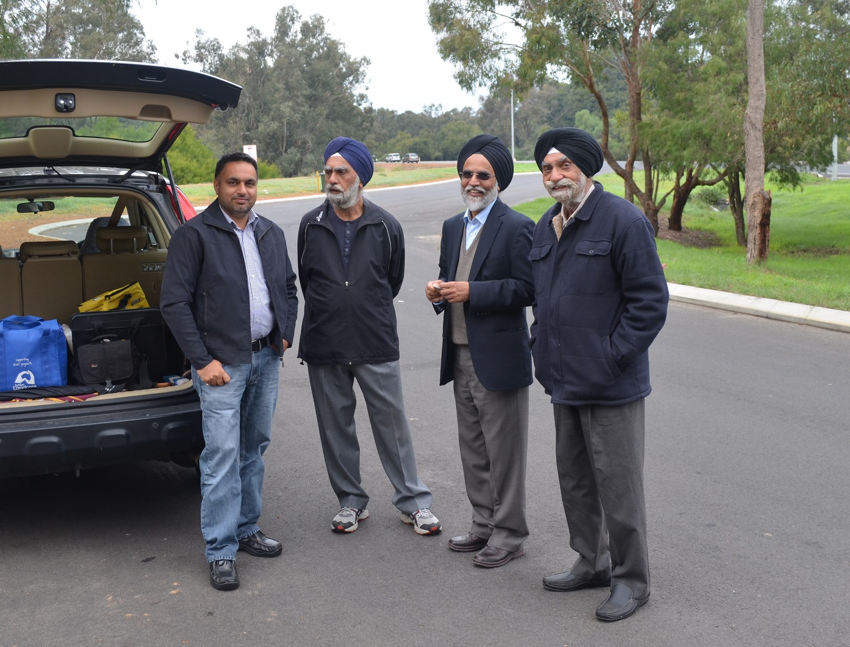 Members of ASHA and the Sikh community (from the left, Harmeek Singh, Dr Amarjeet Singh, Amarjit Singh Pabla and Paramjit Singh)