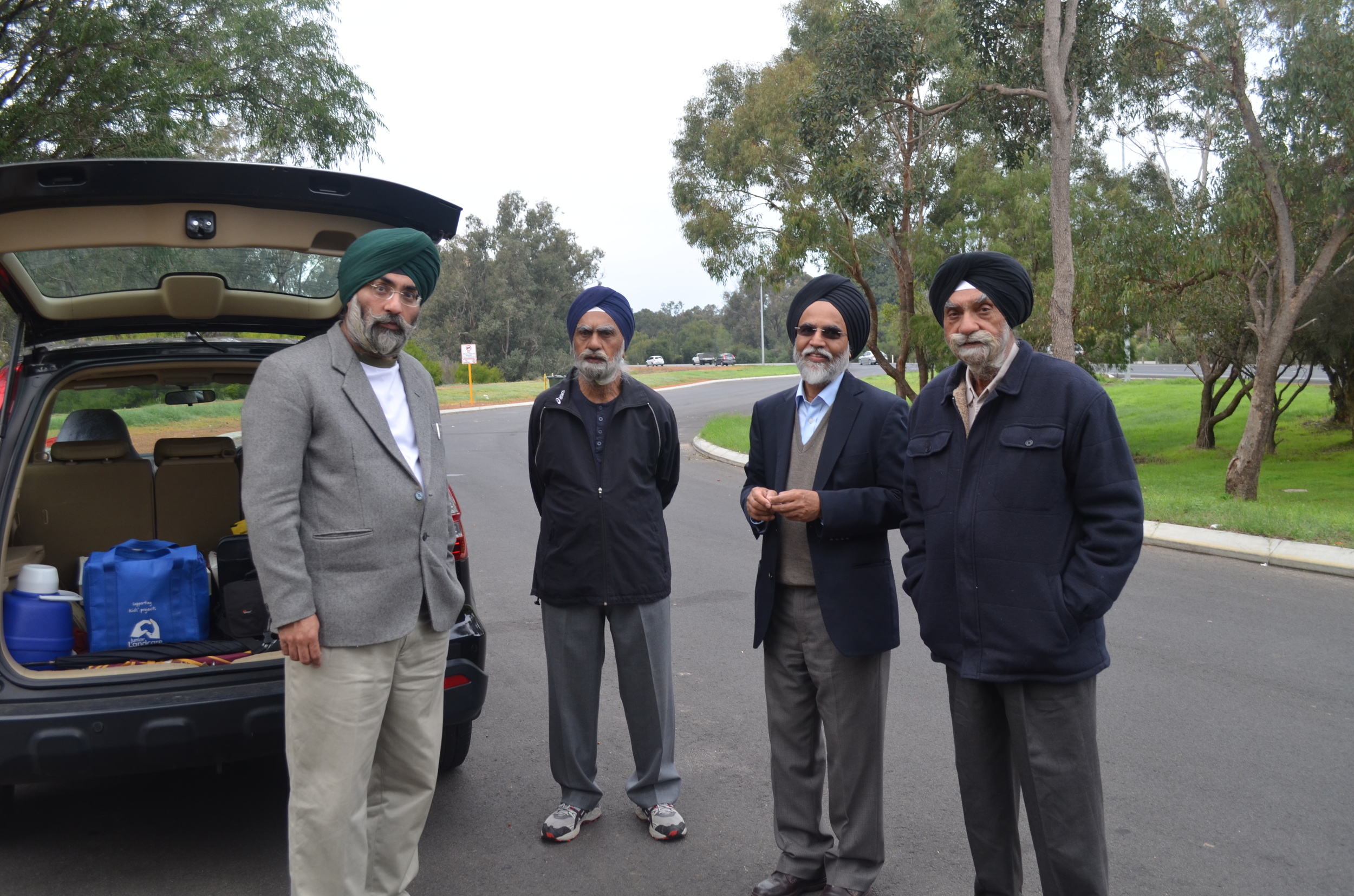 Members of ASHA and the Sikh community (from the left, Tarunpreet Singh, Dr Amarjeet Singh, Amarjit Singh Pabla, Paramjit Singh)