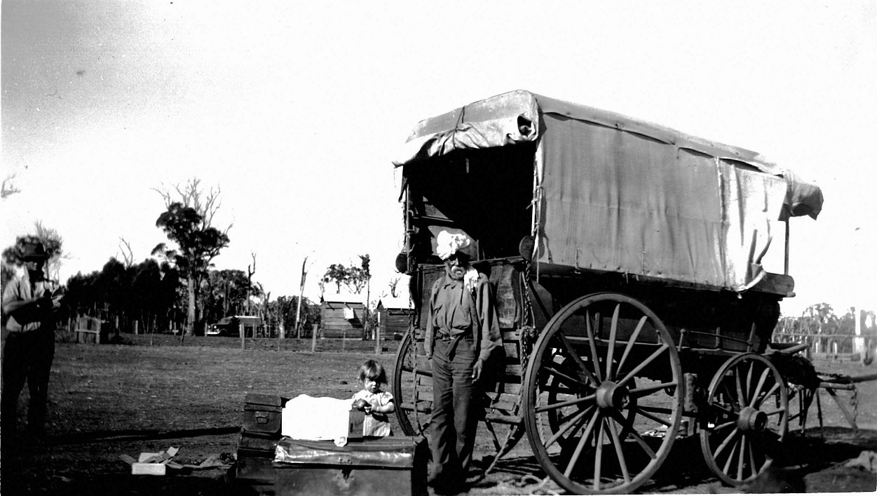 Nehal standing by his wagon.