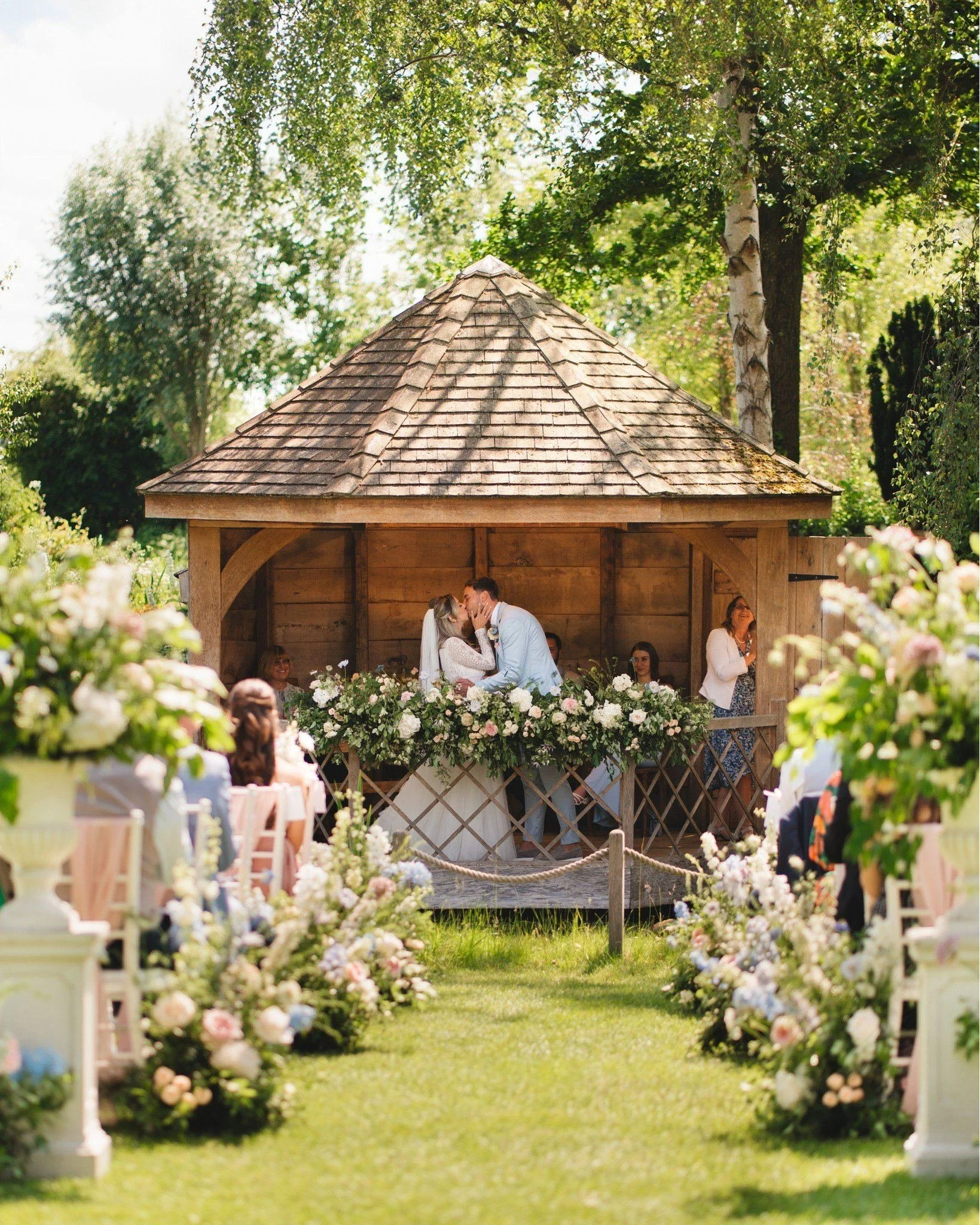 Just swinging by on this dreary day to brighten up your feed with the floral wonderland that was Ellie &amp; Sam's day back in June! I'll never get over these dreamy pastel blooms + decor so brilliantly arranged by @ellysflowerstudio + @misscarlyslea
