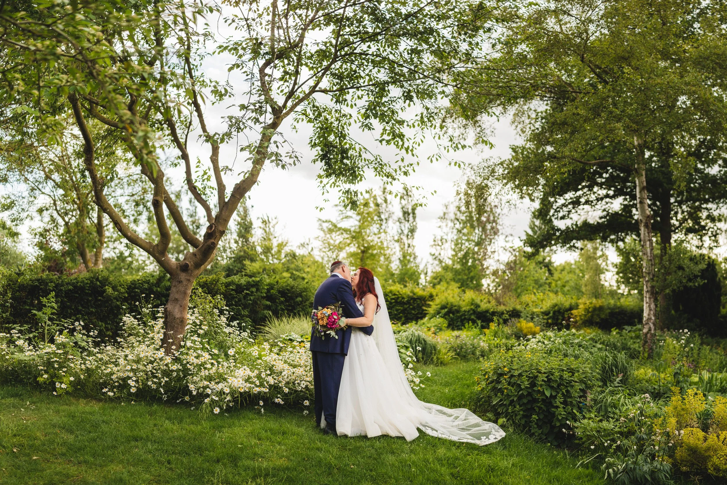 56__june-outdoor-chuppah-wedding-south-farm-hertfordshire.jpg